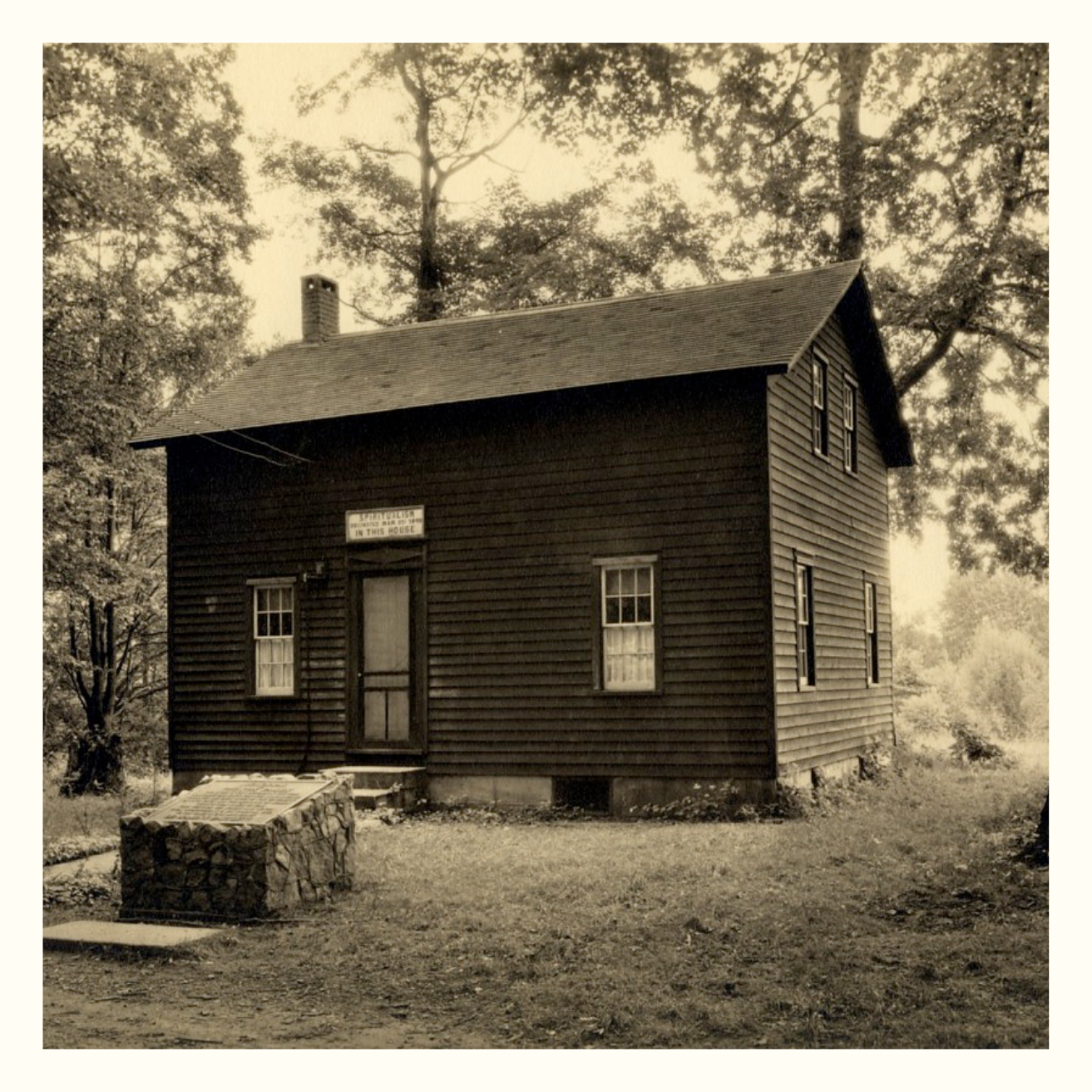 Postcard photo of the original Fox Cottage when it was located in Lily Dale, NY.