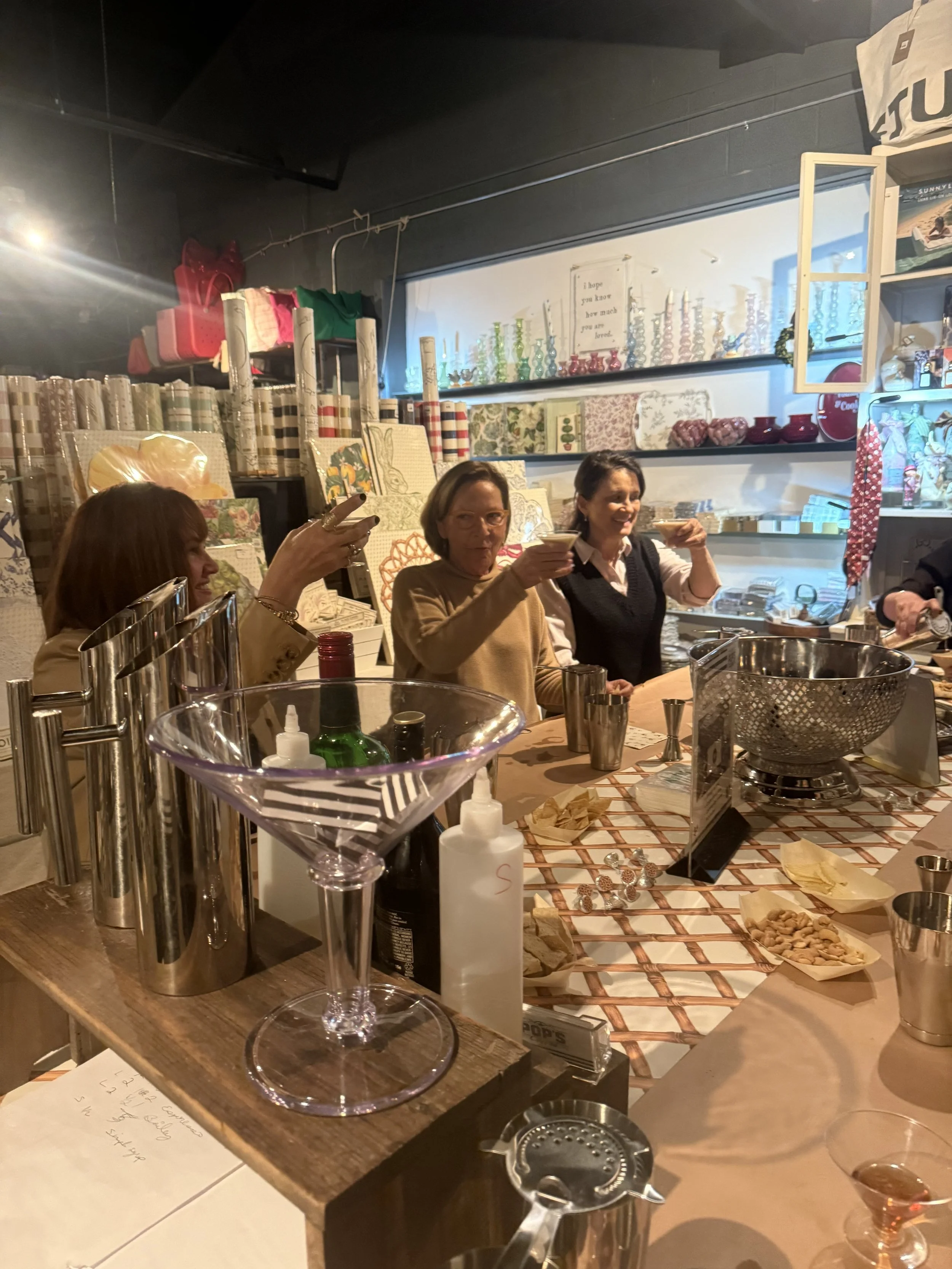 Guests creating and enjoying espresso martinis during a Pop's Premium Coffee interactive class.