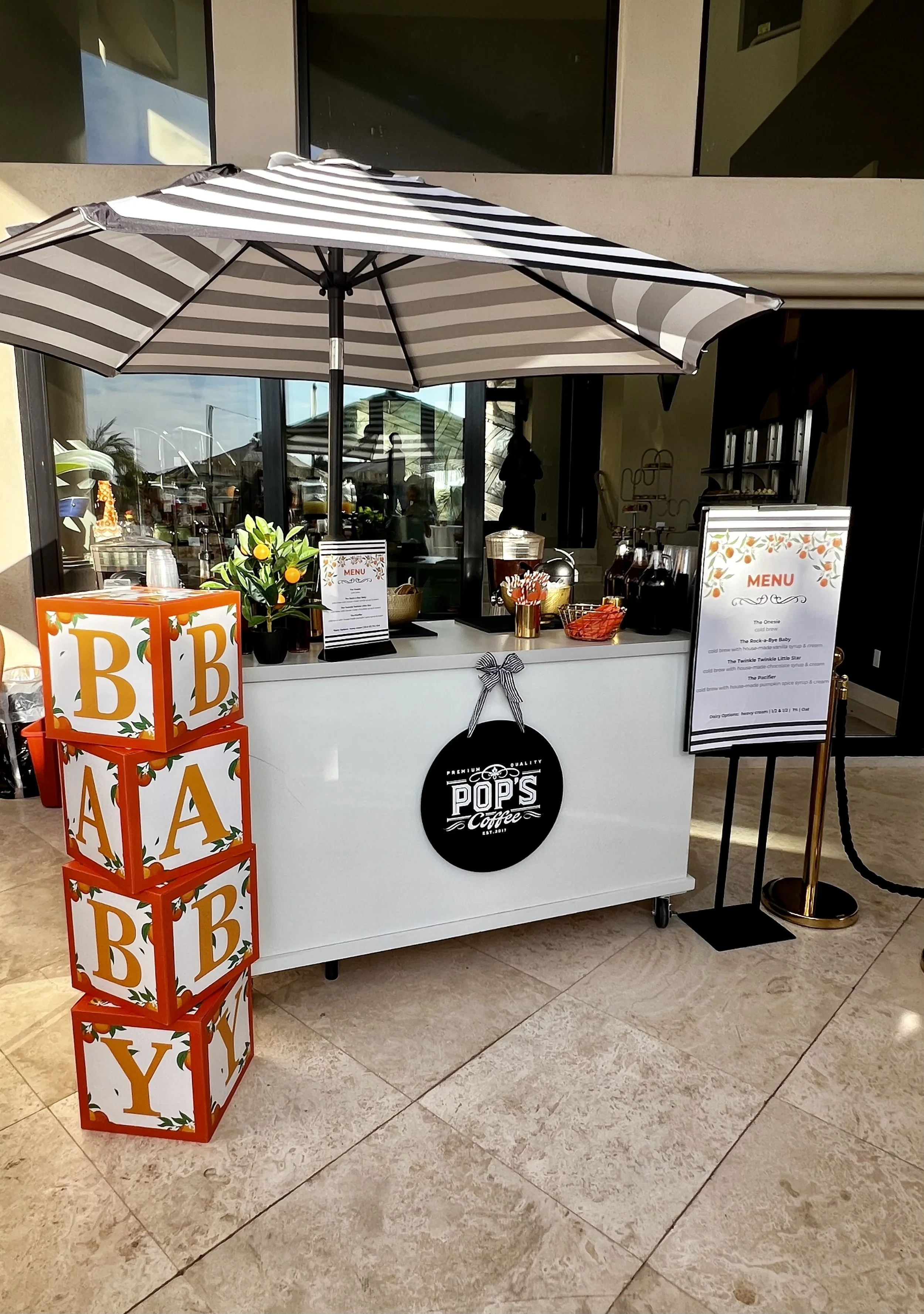 Beautifully styled Pop's Premium Coffee cart ready to serve guests.