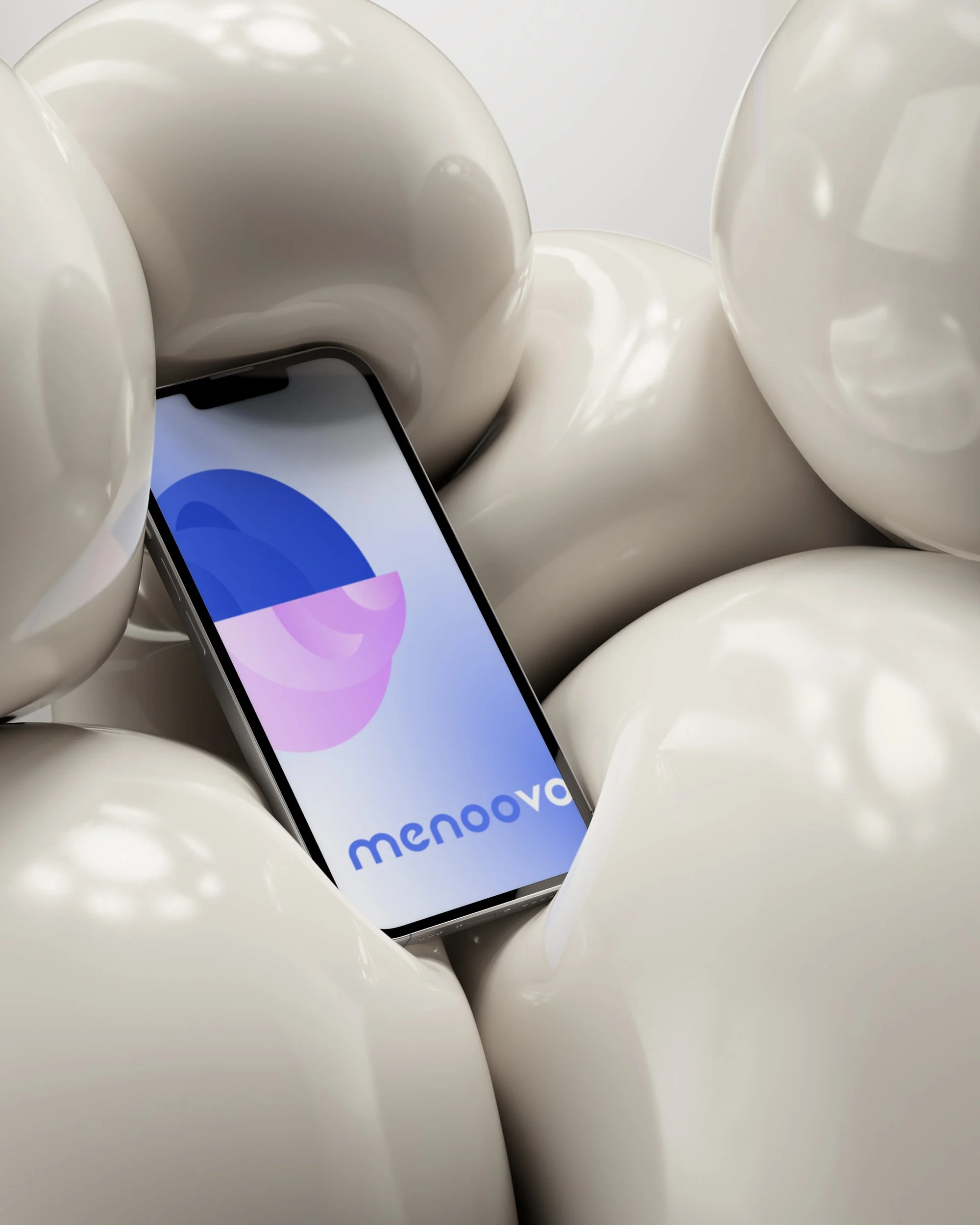 Close-up of a smartphone screen displaying the logo of Lenovo, surrounded by white balloons.