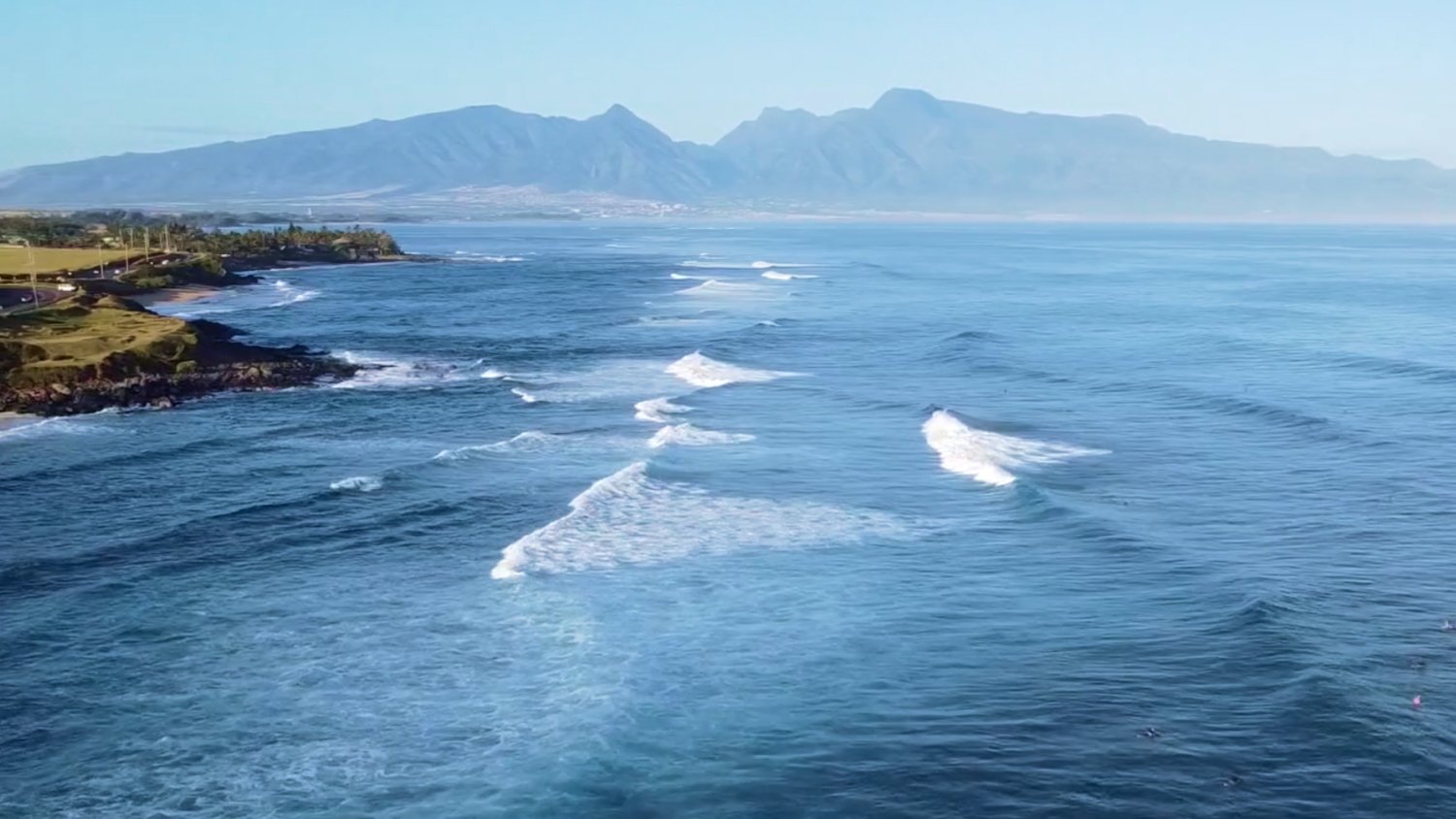 Aerial view of Baldwin Beach at golden hour on Maui's North Shore