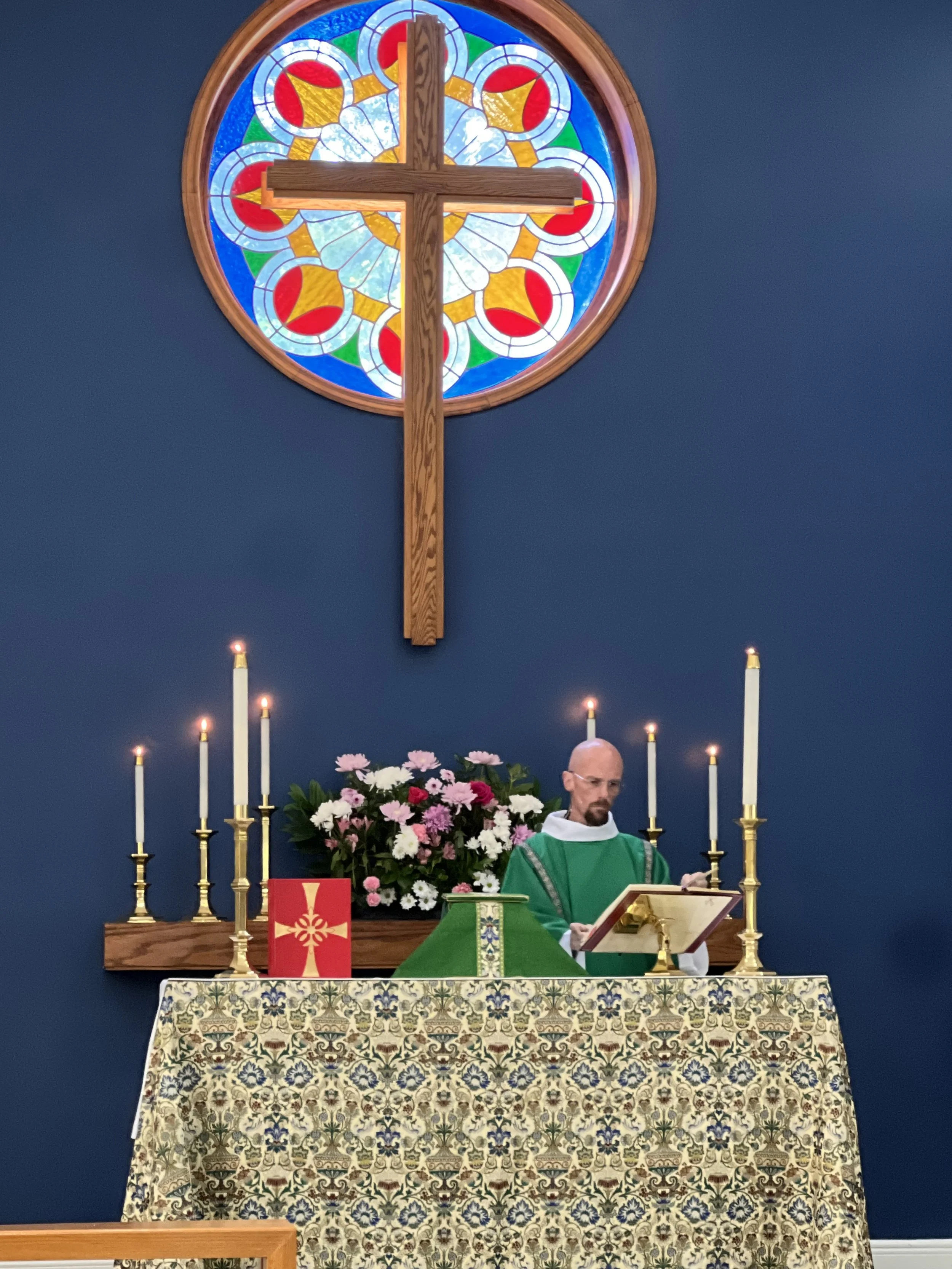 Deacon Jess preparing the altar - 8/16/2026