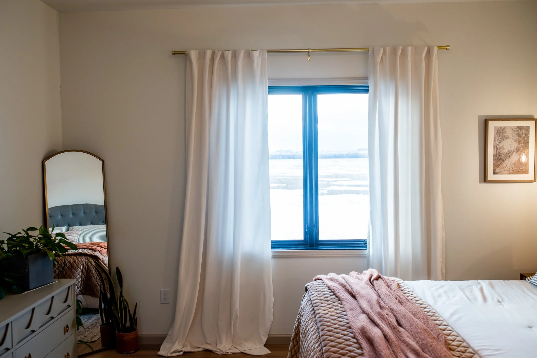 boho bedroom with plants and velvet white curtains