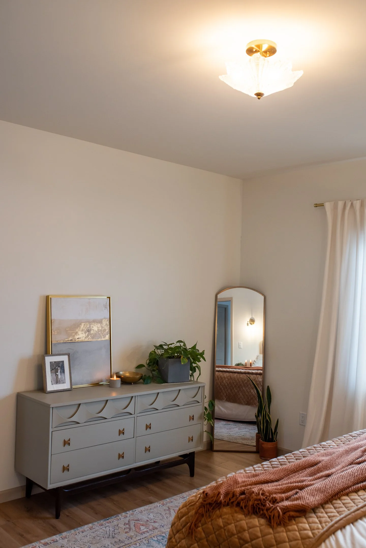 mid century modern dresser and arched mirror