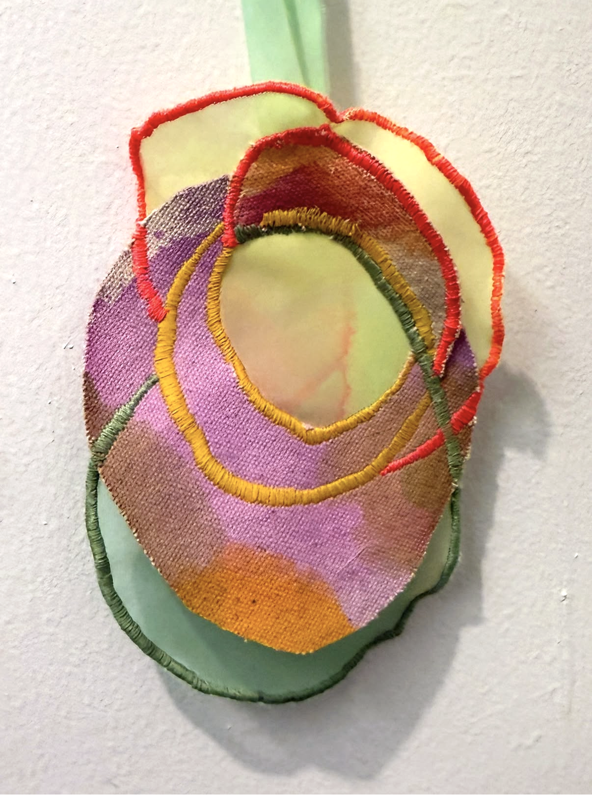 "Pastichette III"
Acrylic on raw canvas and sheer fabric, thread
approx. 9" x 3"