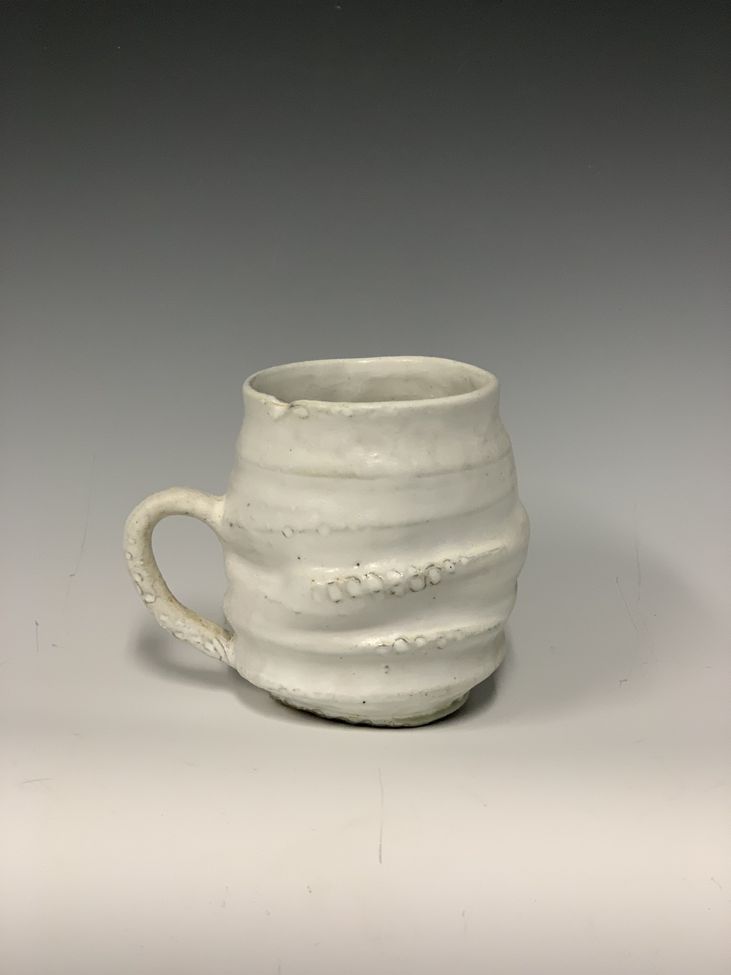Wood-fired, handmade, ceramic mug.
Created: Jacksonville University, 2019.