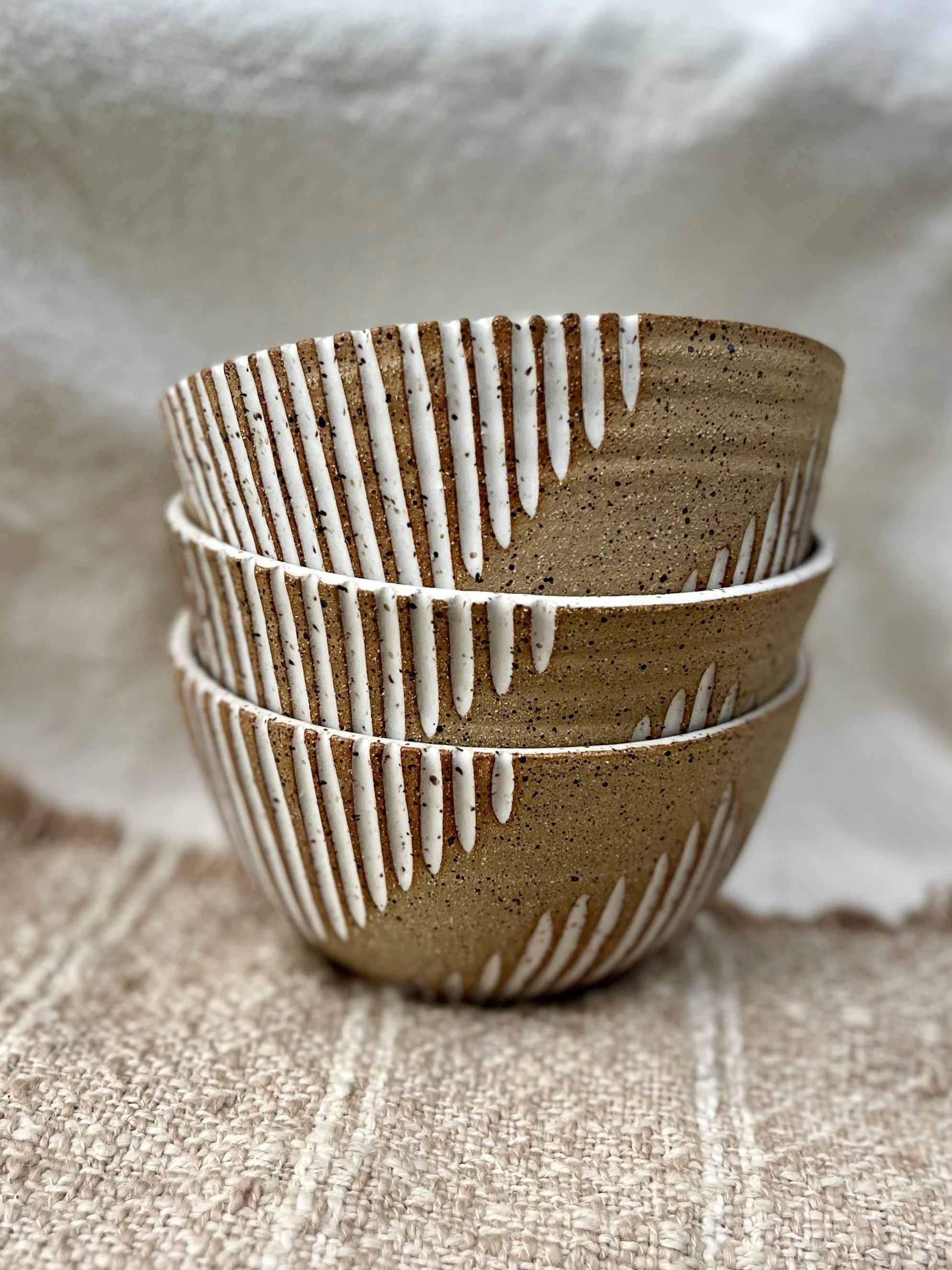 Carved speckle bowls