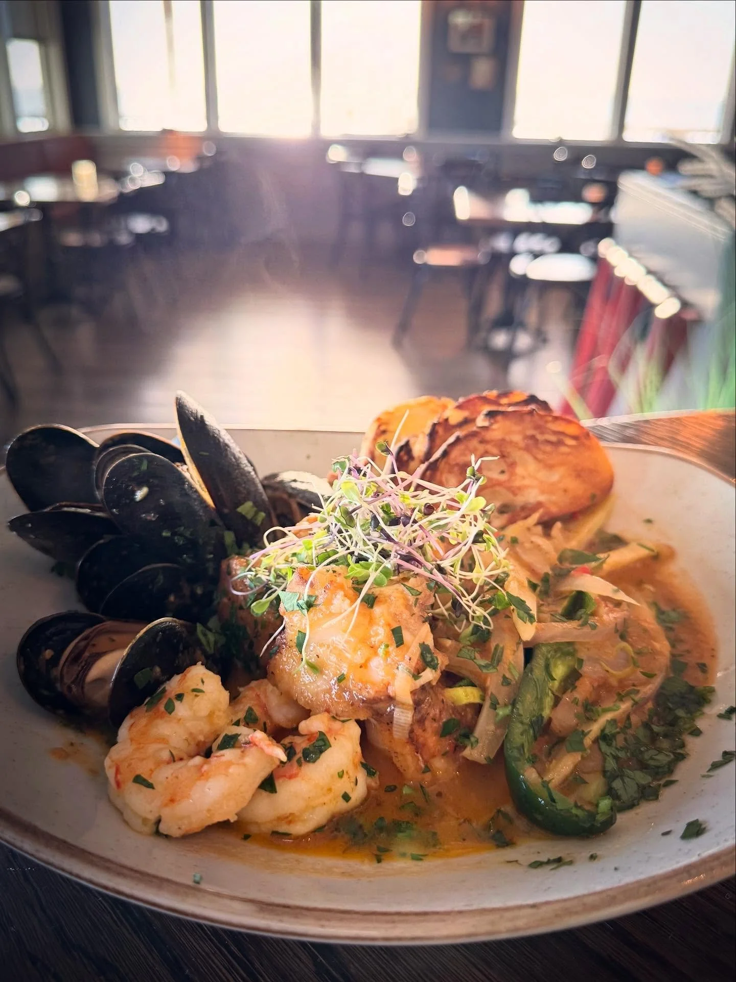 Cioppino is back on the menu at The Village! This seafood stew is the is brimming with fresh seafood - scallops, greentail shrimp, mussels, and monkfish - in a rich tomato fennel broth. Served with grilled baguette for enjoying every drop of that del