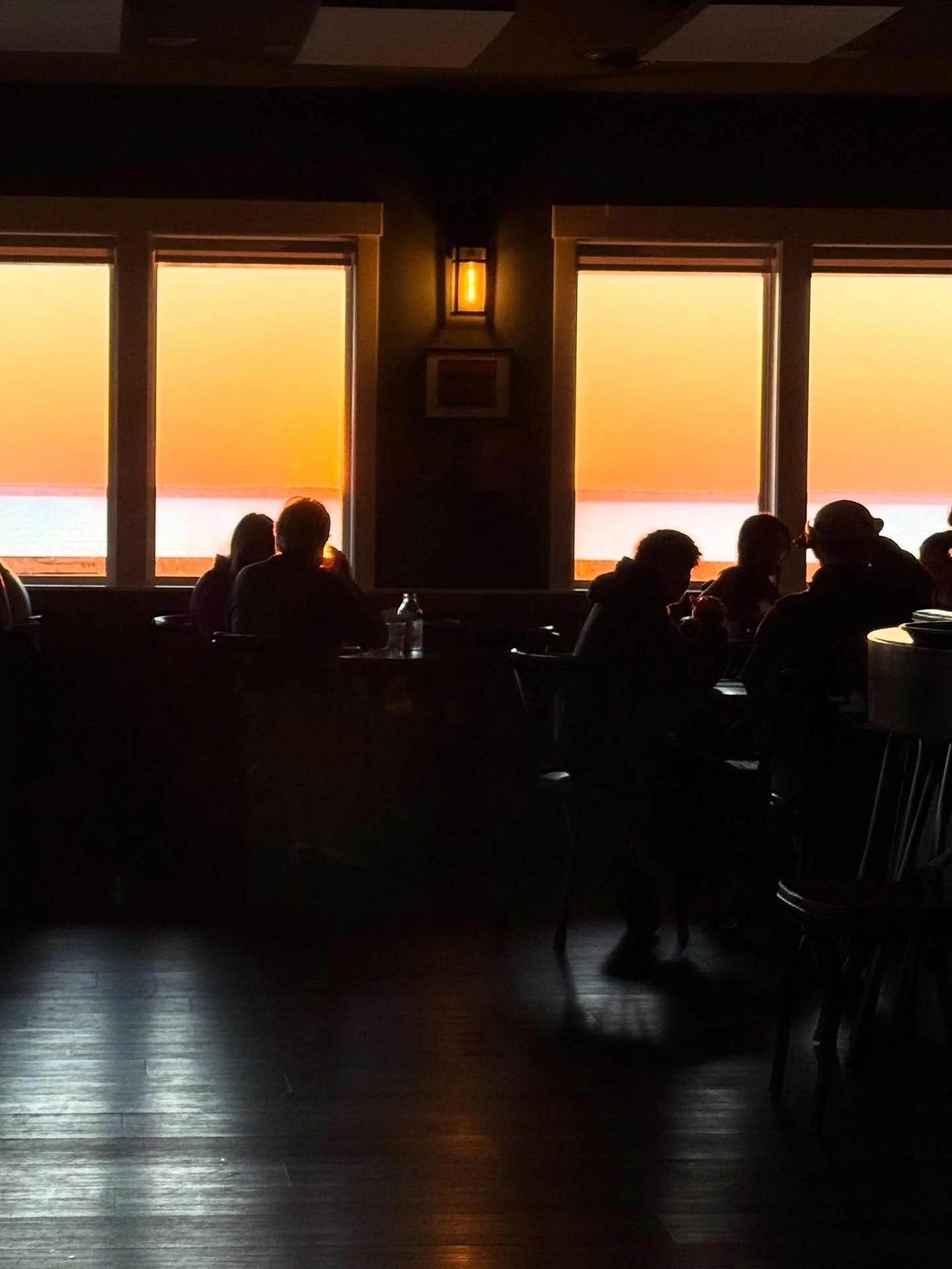 Where will you be when the sun goes down? At The Village Table &amp; Tavern in Duck every seat has a sunset view! We serve elevated tavern fare, distinctive cocktails, and an interesting selection of wine and beer Monday through Saturday. See our men