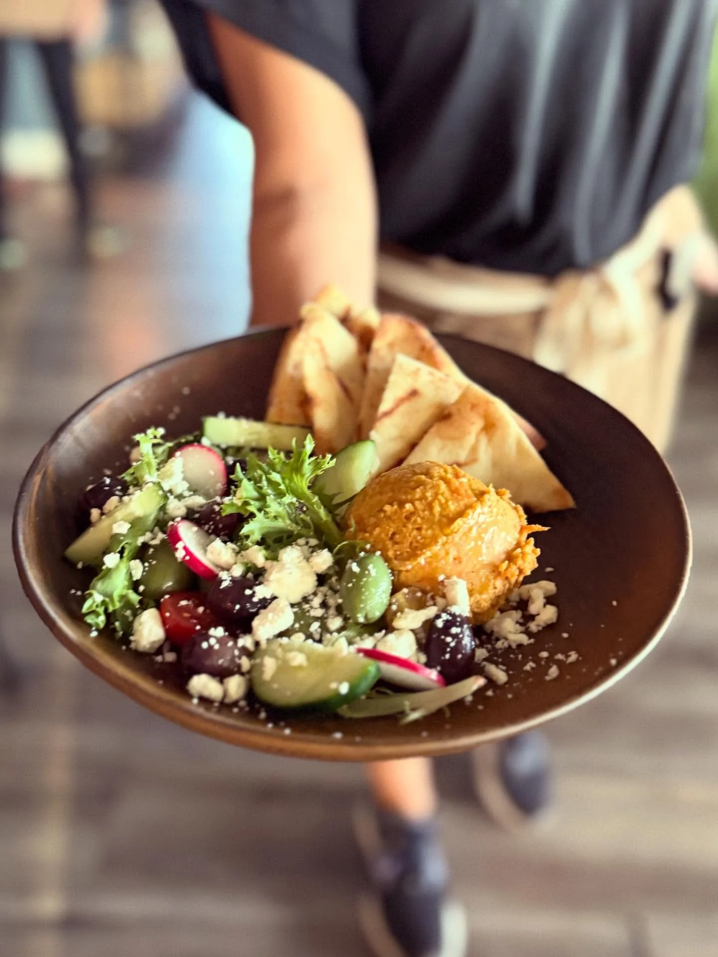 Lunch is served! Our new roasted carrot hummus dish is perfectly shareable starter but add some shrimp, falafel, or grilled chicken and you’ve got a fresh yet satisfying meal. Available for lunch and dinner. 
.
.
#lunch #lunchtime #obxlunch #du