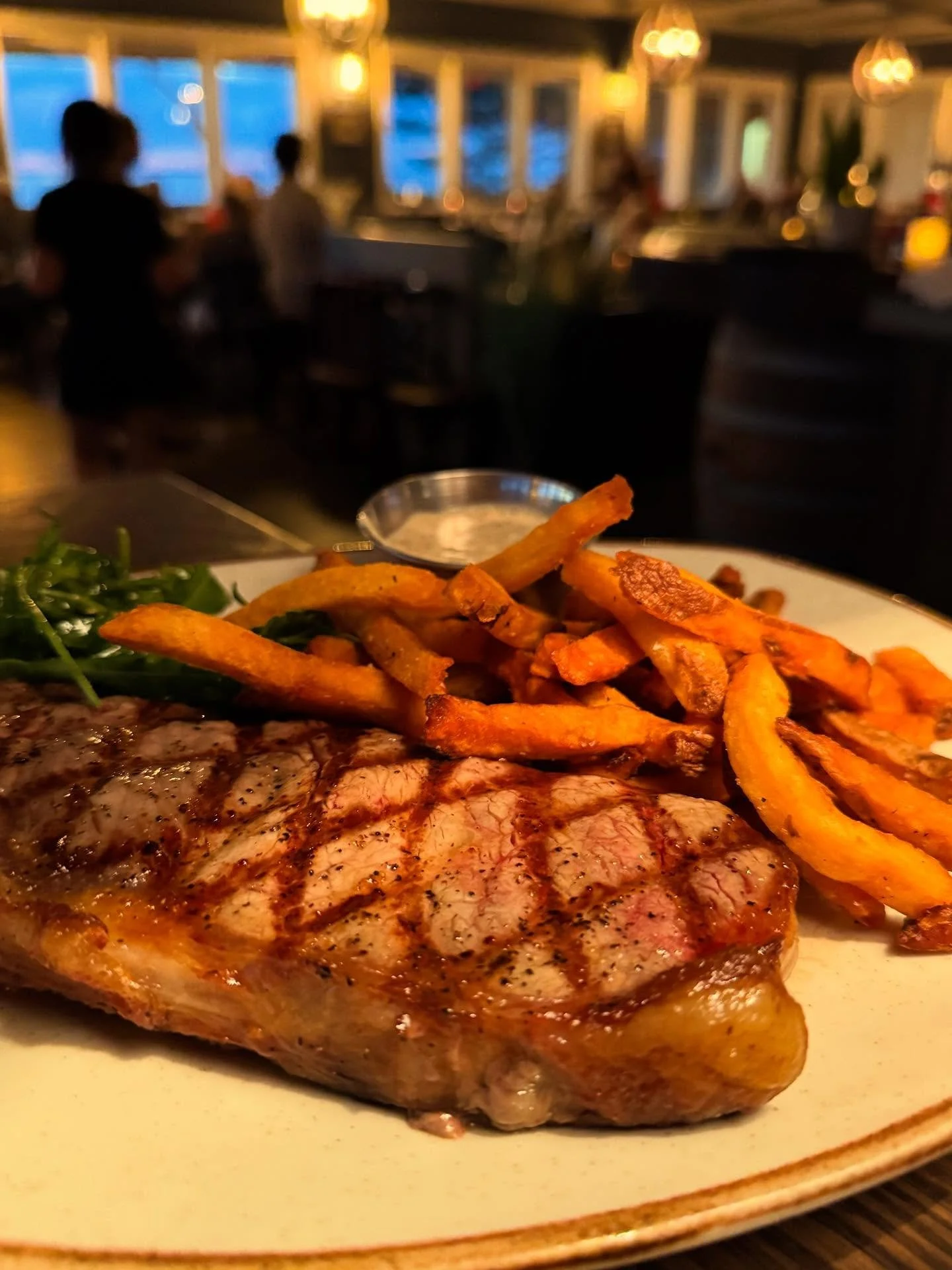 Savor the return of steak frites at The Village Table & Tavern! We’re now featuring a succulent USDA Prime NY strip steak paired with crispy, house-cut fries cooked in rich beef tallow. Complemented by our signature house-made Béarna