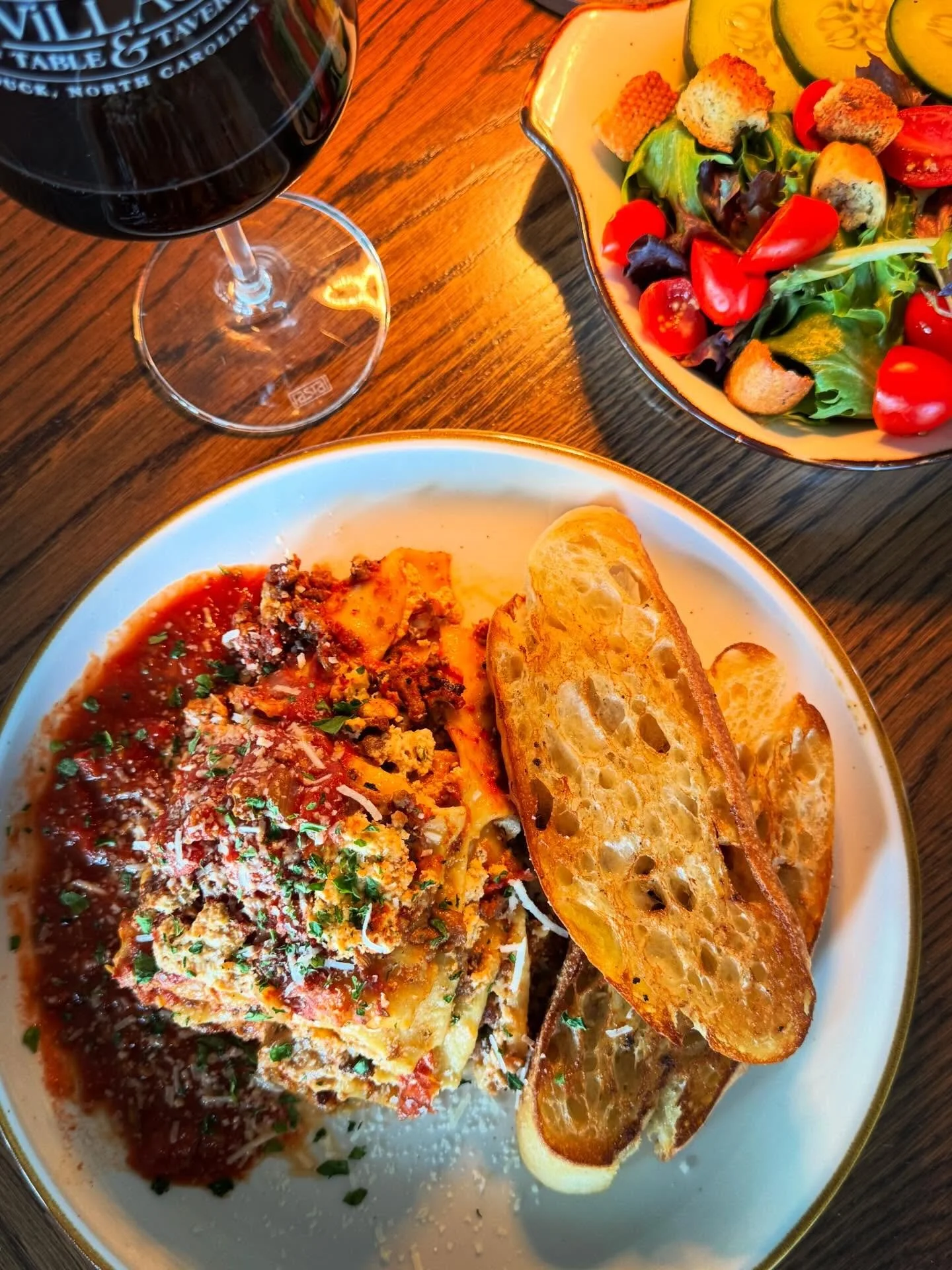 Tuesday is Lasagna Night at The Village! Join us for $25 lasagna dinner which includes a hearty portion of Chef Kevin&rsquo;s family recipe lasagna, choice of salad, and garlic toast. Bonus: select Italian wines by the glass🍷are just $10! Call 252-7