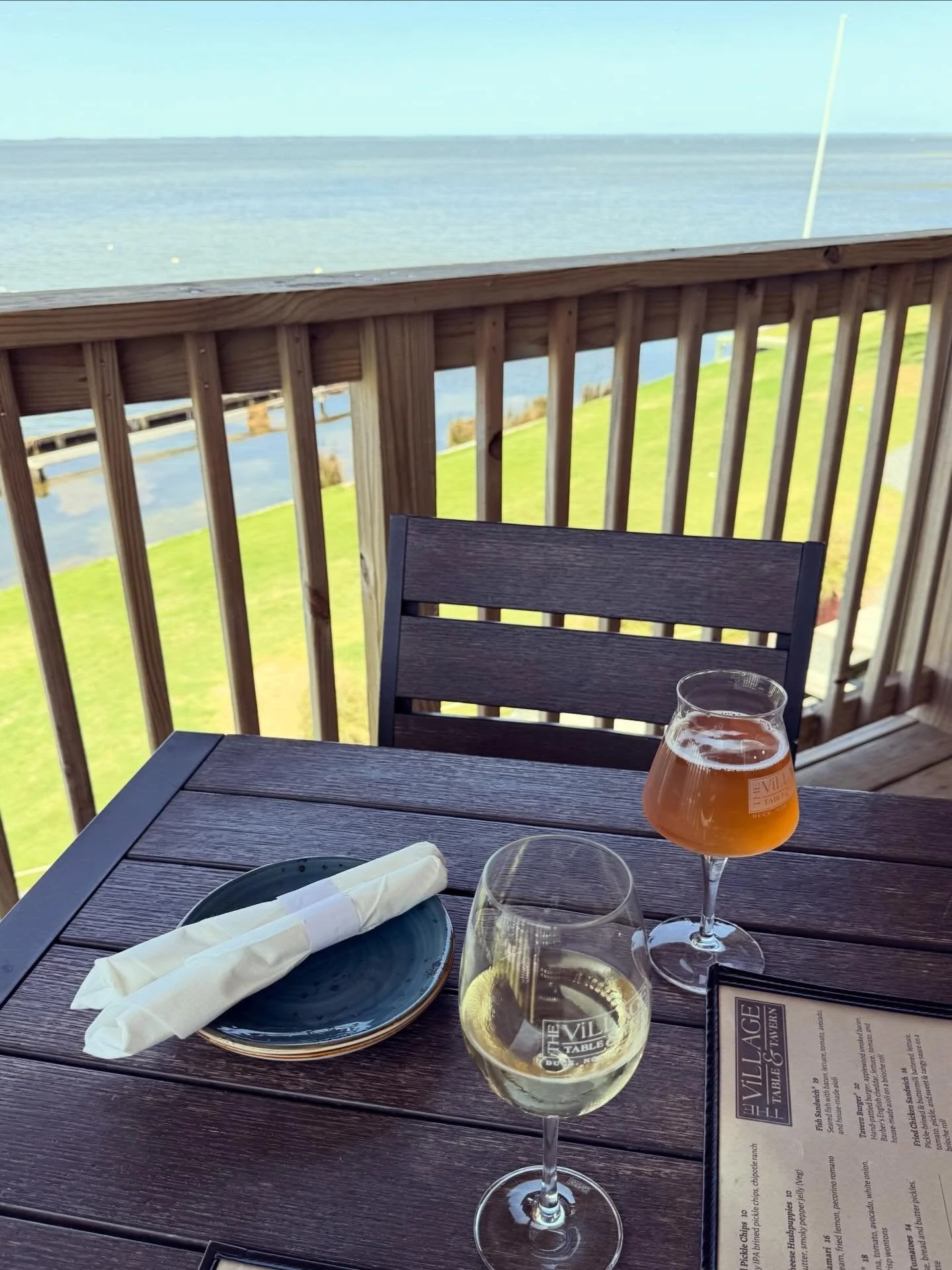 It&rsquo;s a delightful day for deck dining at The Village in Duck! Savor the scene during lunch until 2:30 or dinner starting at 4. Cheers! 
&bull;
#obxvillage #obxlunch #obxdinner #waterfrontdining #obxalfresco