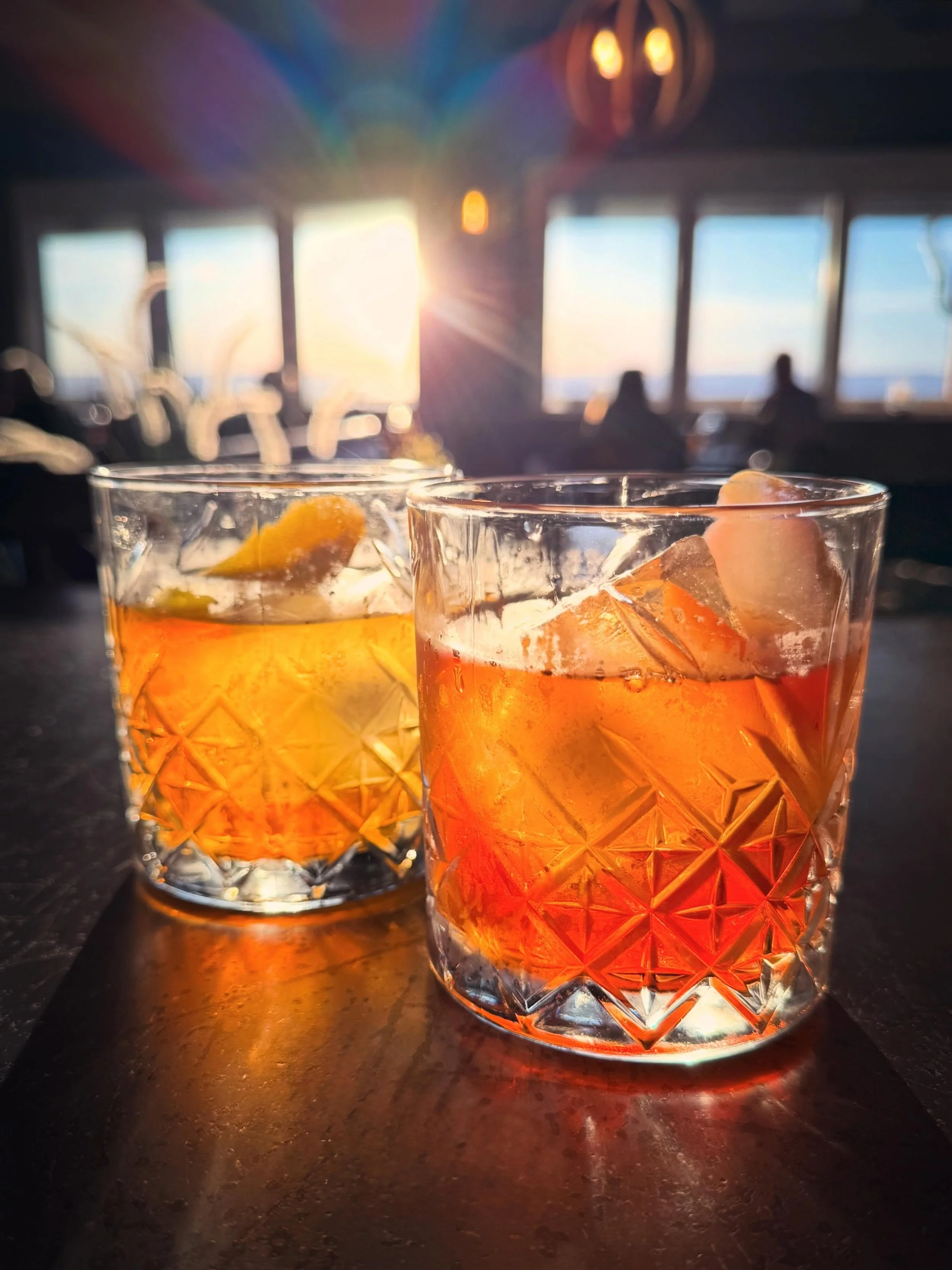 Happy Friday! Join us at The Village tonight for drinks, dinner, and sunset. Cheers! 
&bull;
#cocktails #cheers #dinnerwithaview #obxsunset #obxvillage