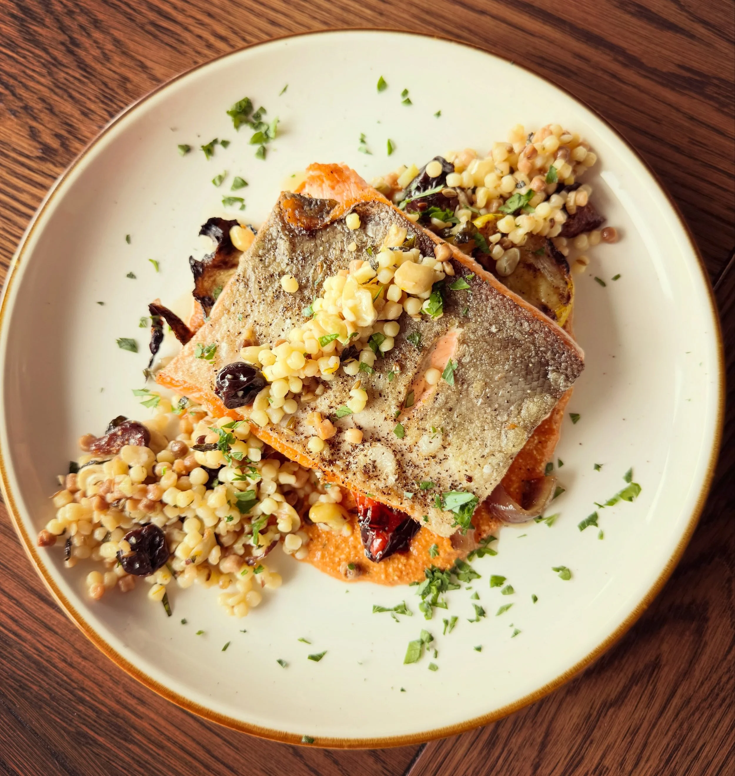 We rarely stray from local waters for our fish specials &mdash; except when we can get our hands on wild Alaskan coho salmon during its fleeting season. Mild, firm, and subtly sweet, it&rsquo;s paired tonight with dried fruit &amp; preserved lemon Sa