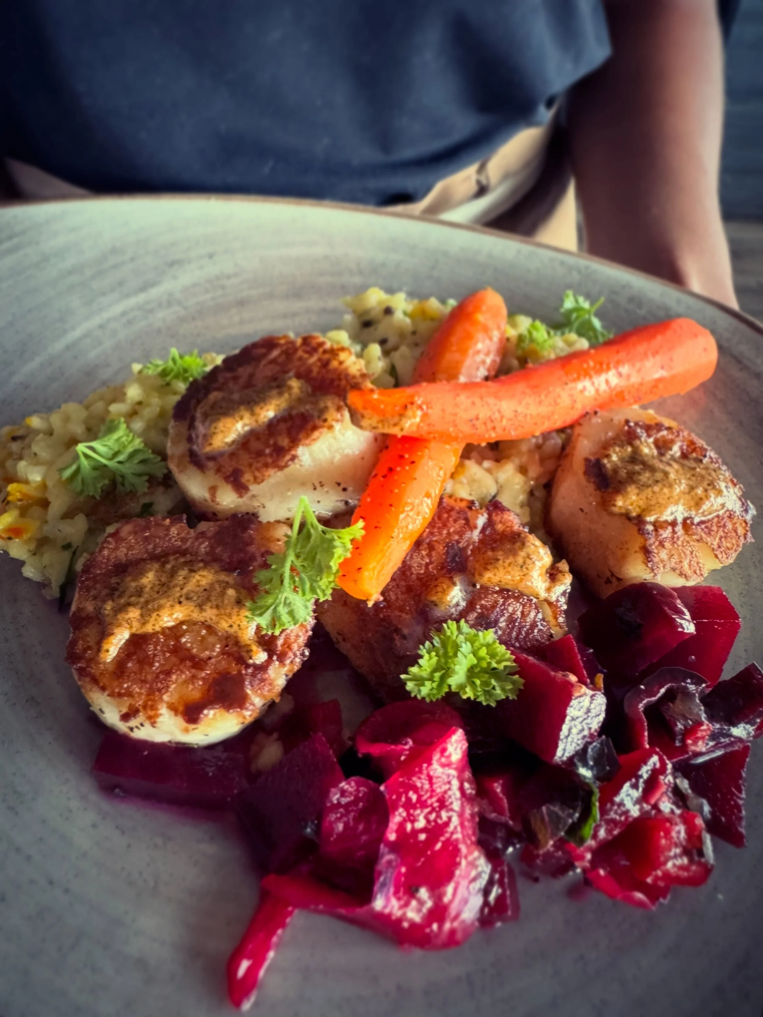 Meet one of the stars of our summer menu: perfectly seared scallops, saffron Carolina Gold rice, grilled baby carrots, vibrant beet salad, and a smoky charred pepper pur&eacute;e that makes the whole dish sing.
&bull;
#dinnerwithaview #obxdinner #sea
