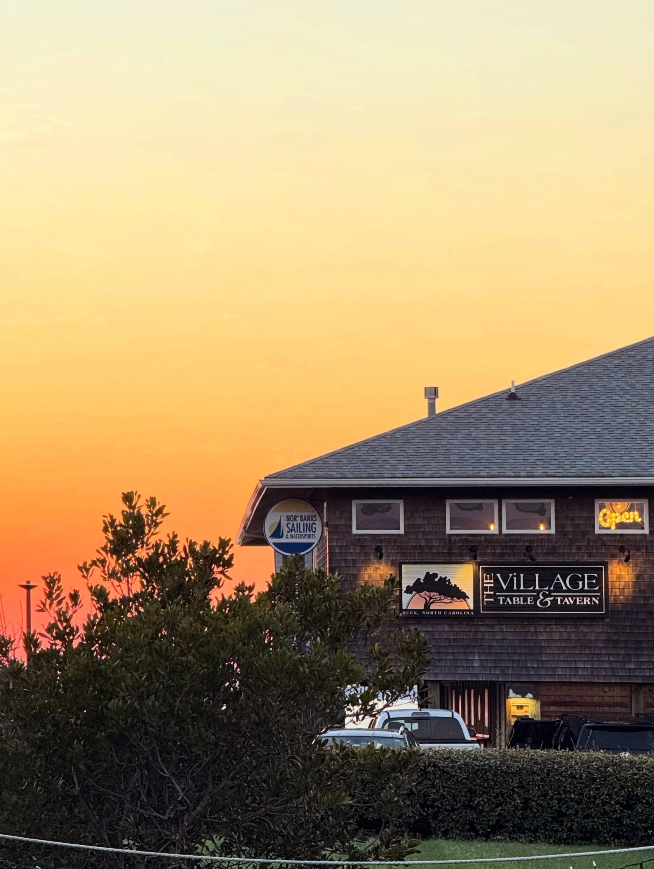 Savor the sunset at The Village! Serving dinner, drinks, and waterfront sunset views Monday-Saturday. 
&bull;
#obxsunset #waterfrontdining #dinnerwithaview #ducknc #obx