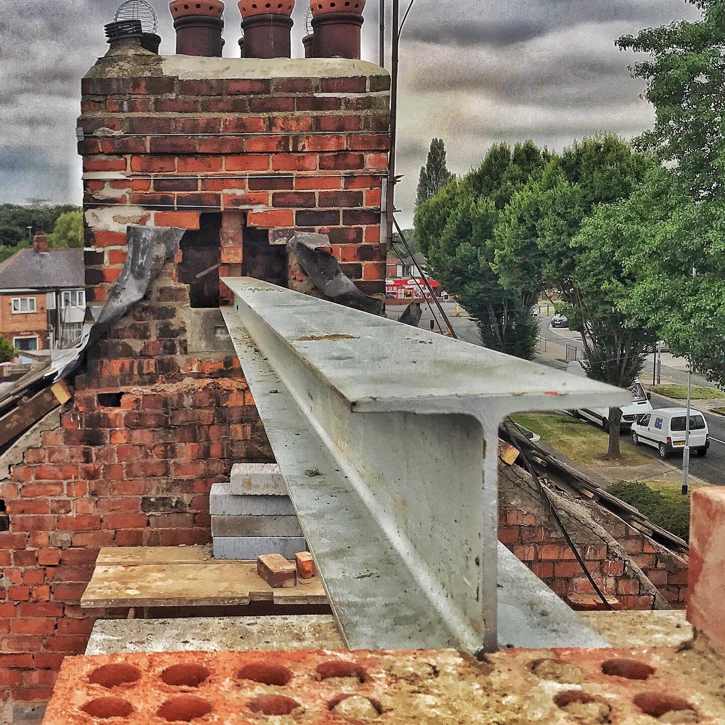 LOFT CONVERSION - Installation of a steel ridge beam. Bearing steel beams onto a working chimney stack is a no-no. But this stack has been removed up to eaves level and is supported by more steelwork below... 👌

#hull #structural #engineering #const