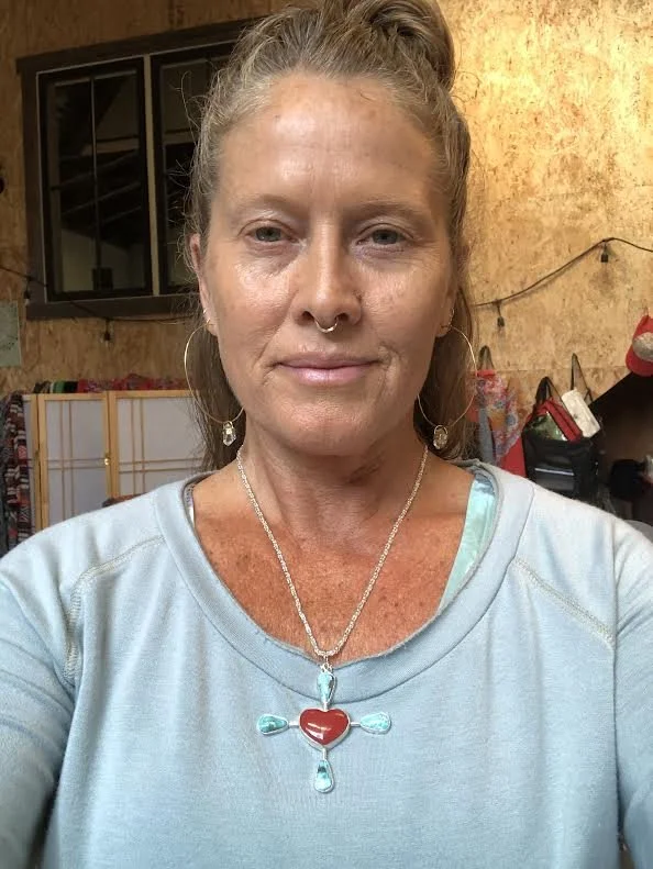 Custom design with your unique interests in power and protection.  Four directions pendant with turquoise and a rosarita heart. Shen Ring Healing Arts