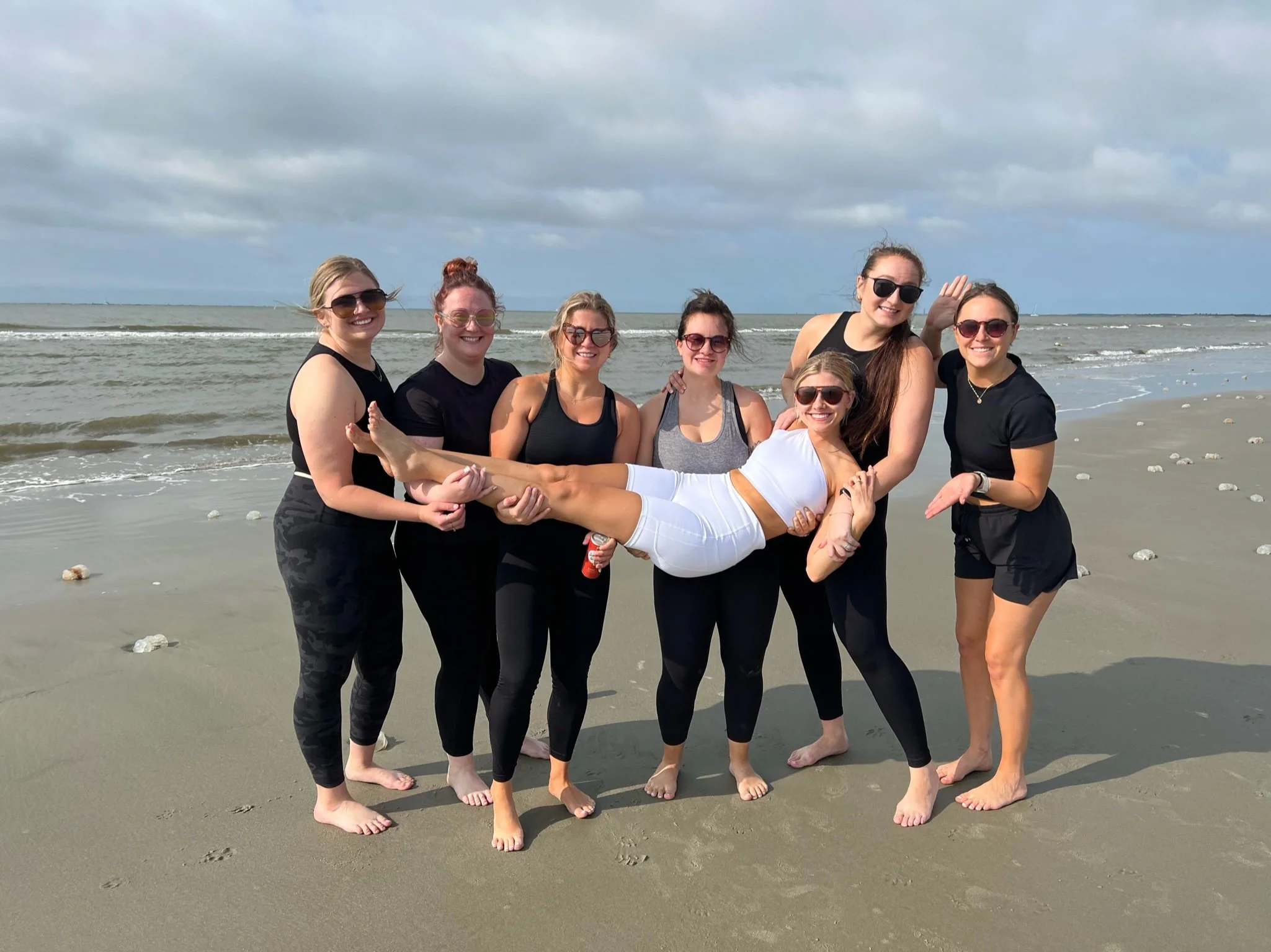 a-group-of-females-enjoying-on-beach