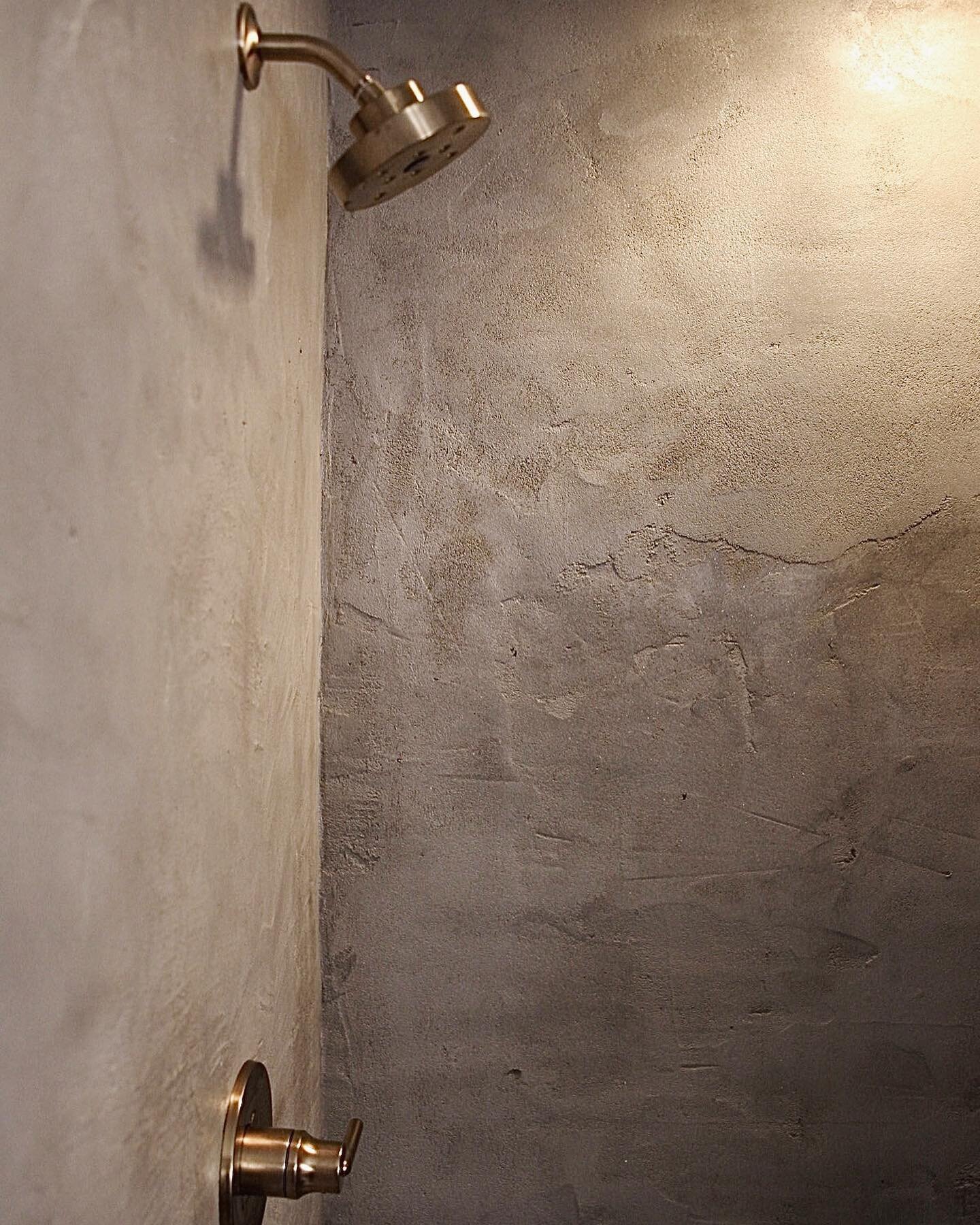 A concrete shower - we tested this &ldquo;old world&rdquo; style process in the Farmhouse Apartment - membrane, lathe and the right mortar mix. Even the shower pan is just sealed concrete. We love the texture and movement.