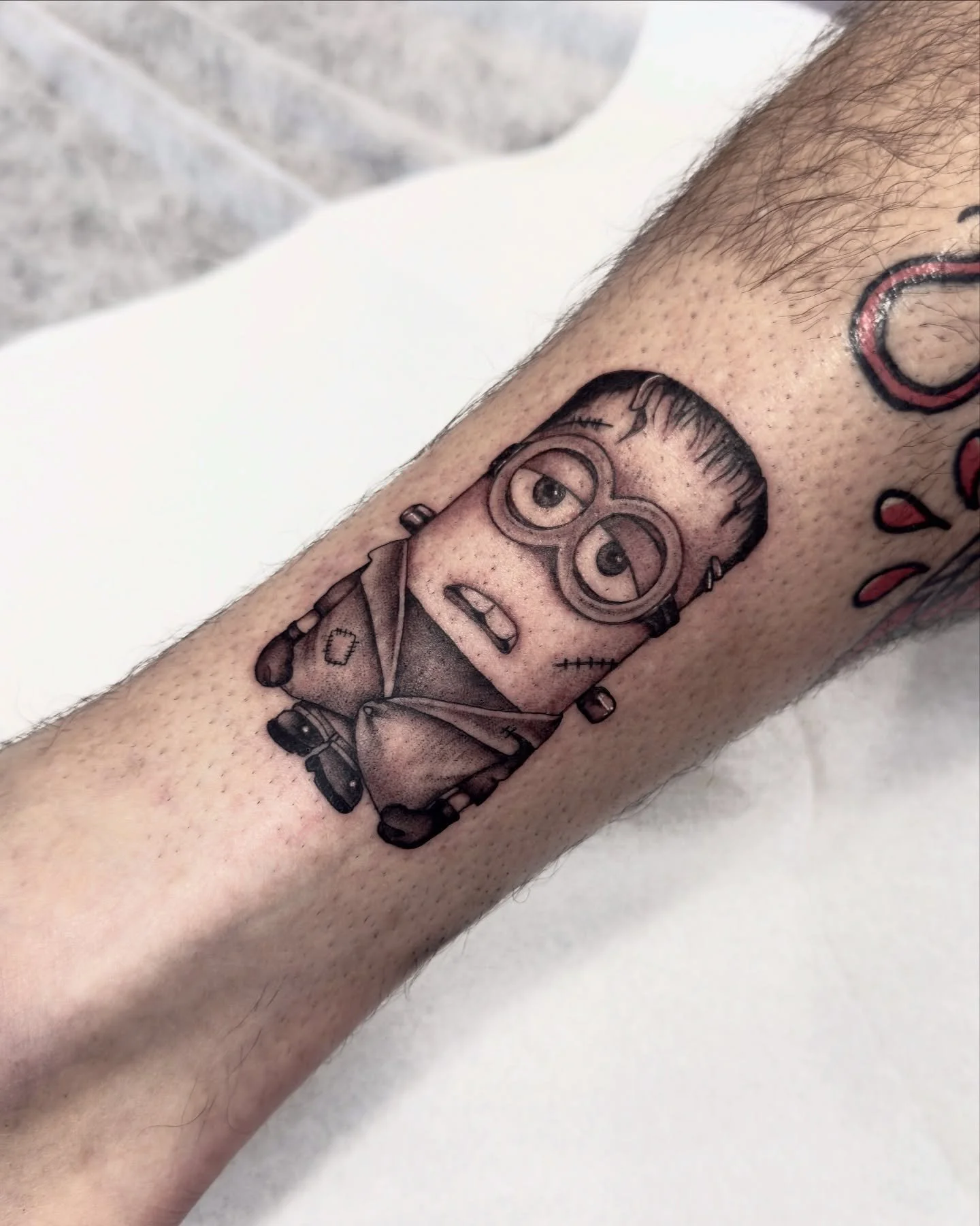 A Halloween Franken-minion ankle jammer for his son Sawyer
.
.
.
#miniontattoo #minions #halloweentattoo #savannahtattooartist #georgiatattooartist #savannahga