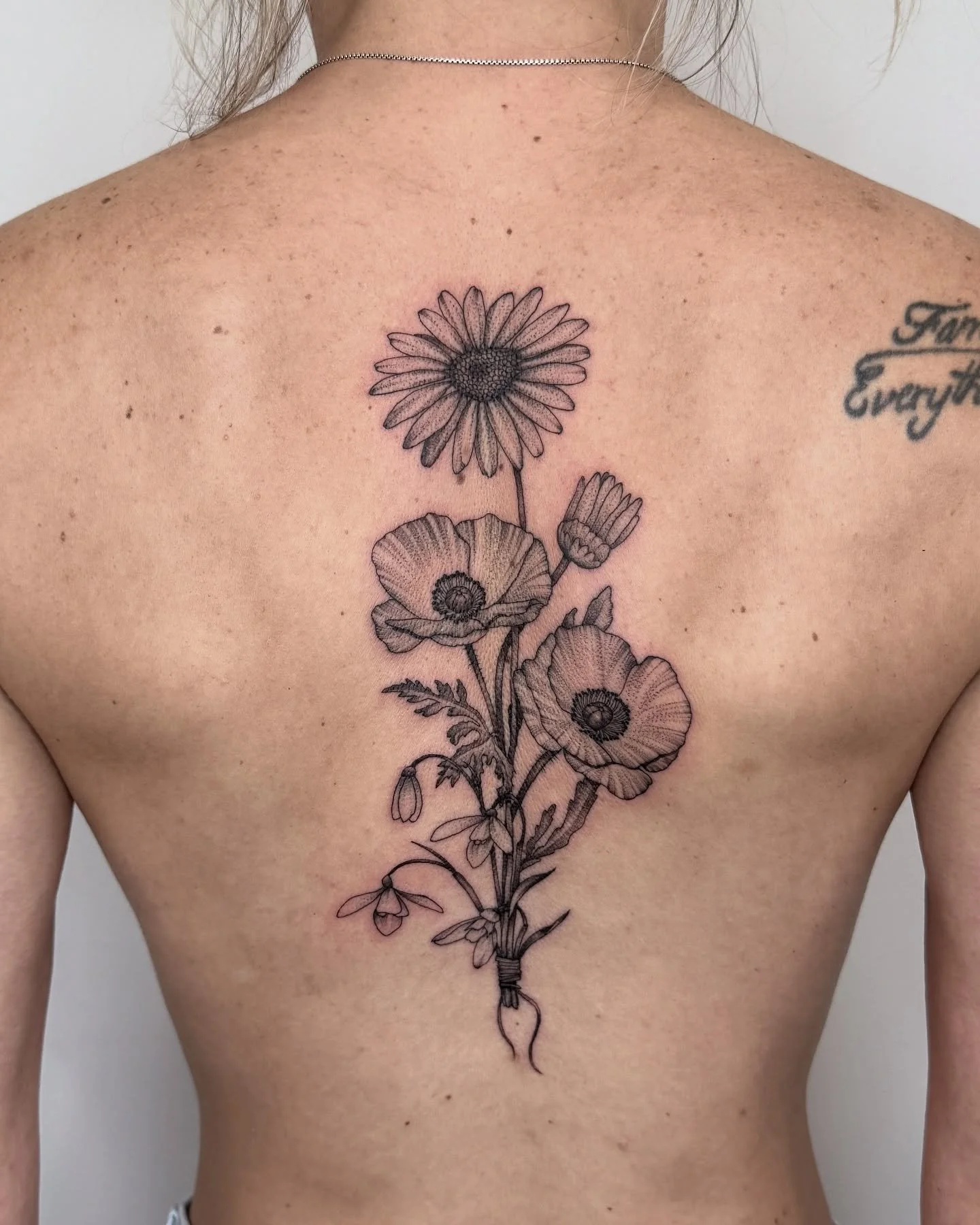 💐 Some fine line florals made for Olivia. Thanks again for making the drive! 
.
.
.
#finelineflowers #floraltattoo #finelinetattoos #savannahtattooartist #georgiatattooartist #savannahga #spinetattoo #birthflowertattoo
