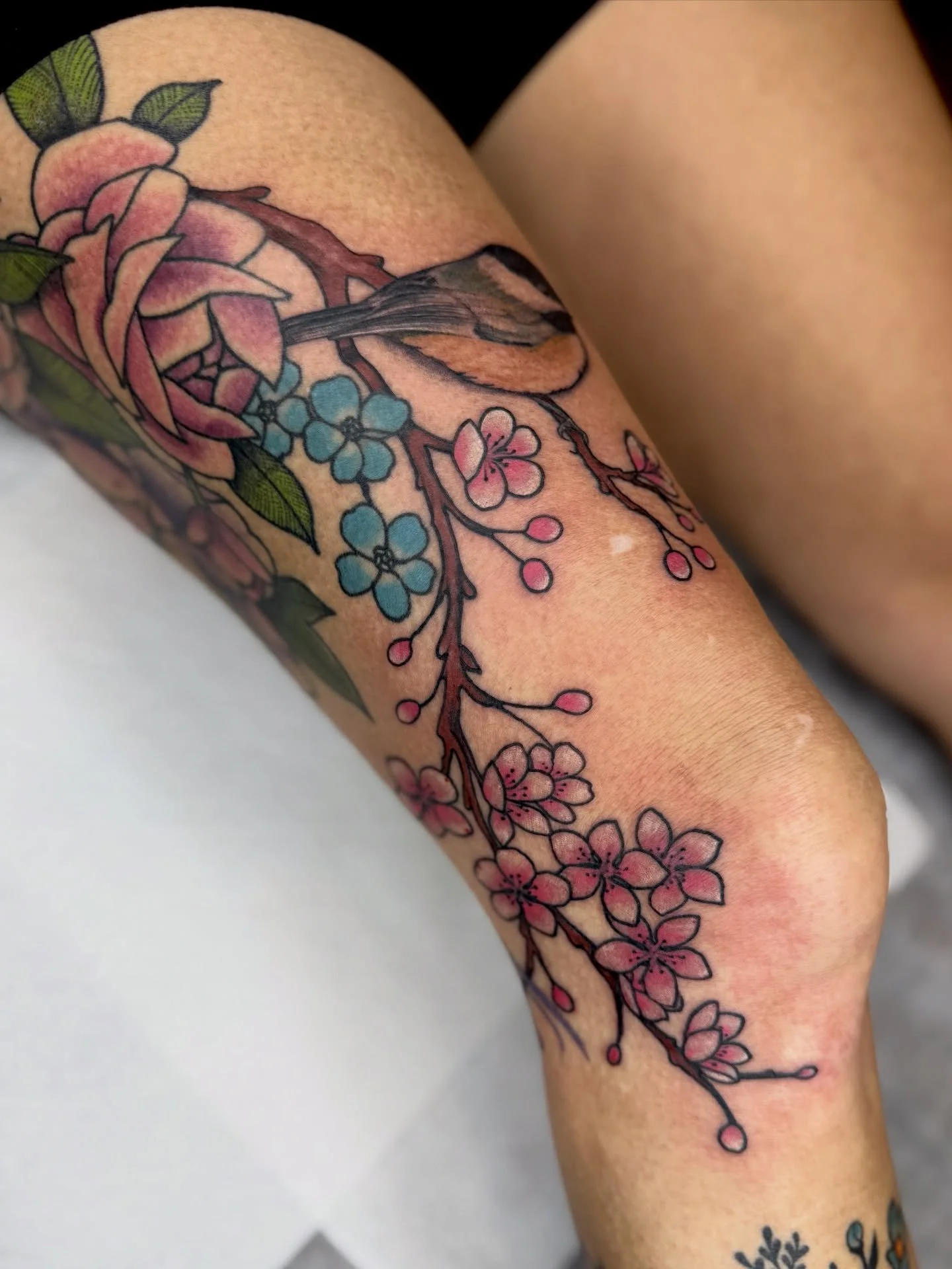 Chickadee and floral addition to Misty&lsquo;s knee. 

The bird and cherry blossoms are new. Everything else is healed. Thanks again!
