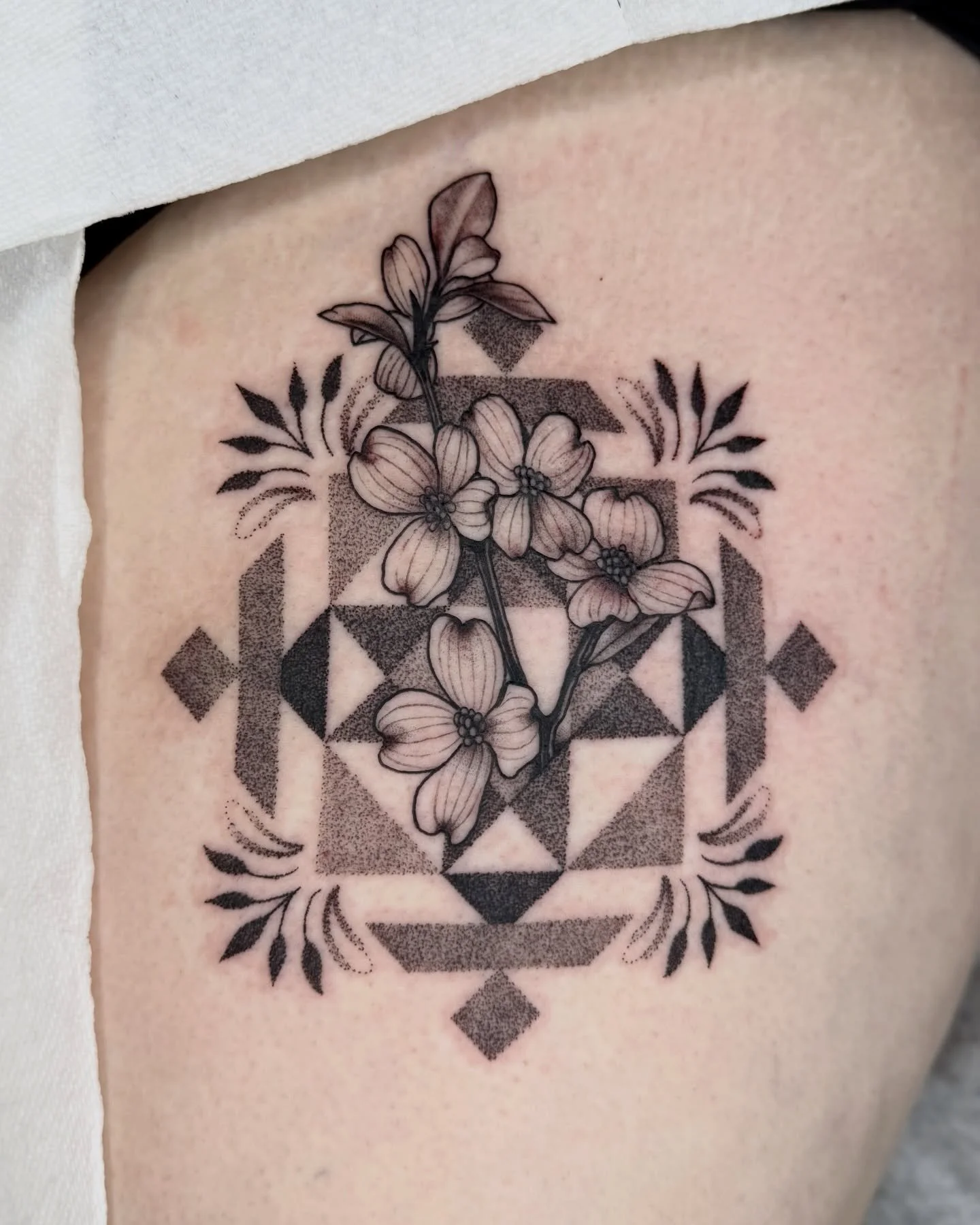 Dogwood flowers and a quilt pattern. Super fun one and also her first tattoo. Thanks again!
