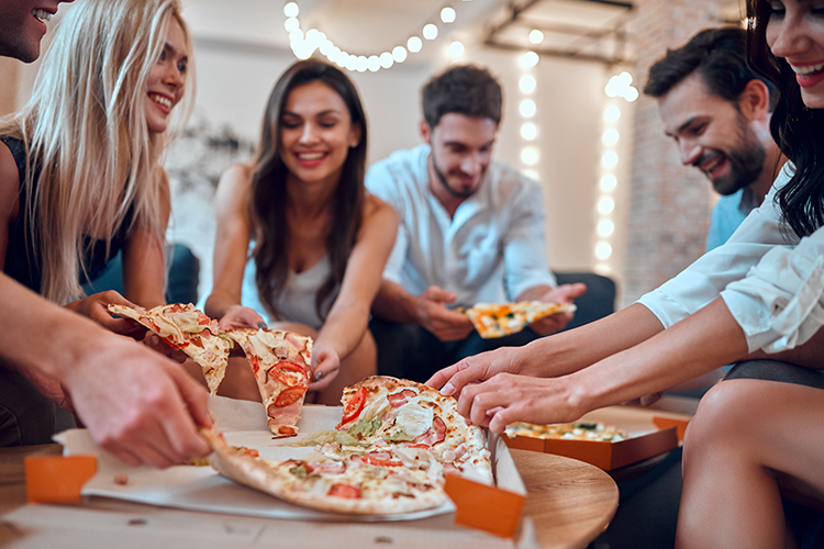 4 Reasons You and Your Friends Should Enjoy a Slice of Pizza — Top in Town  Pizza