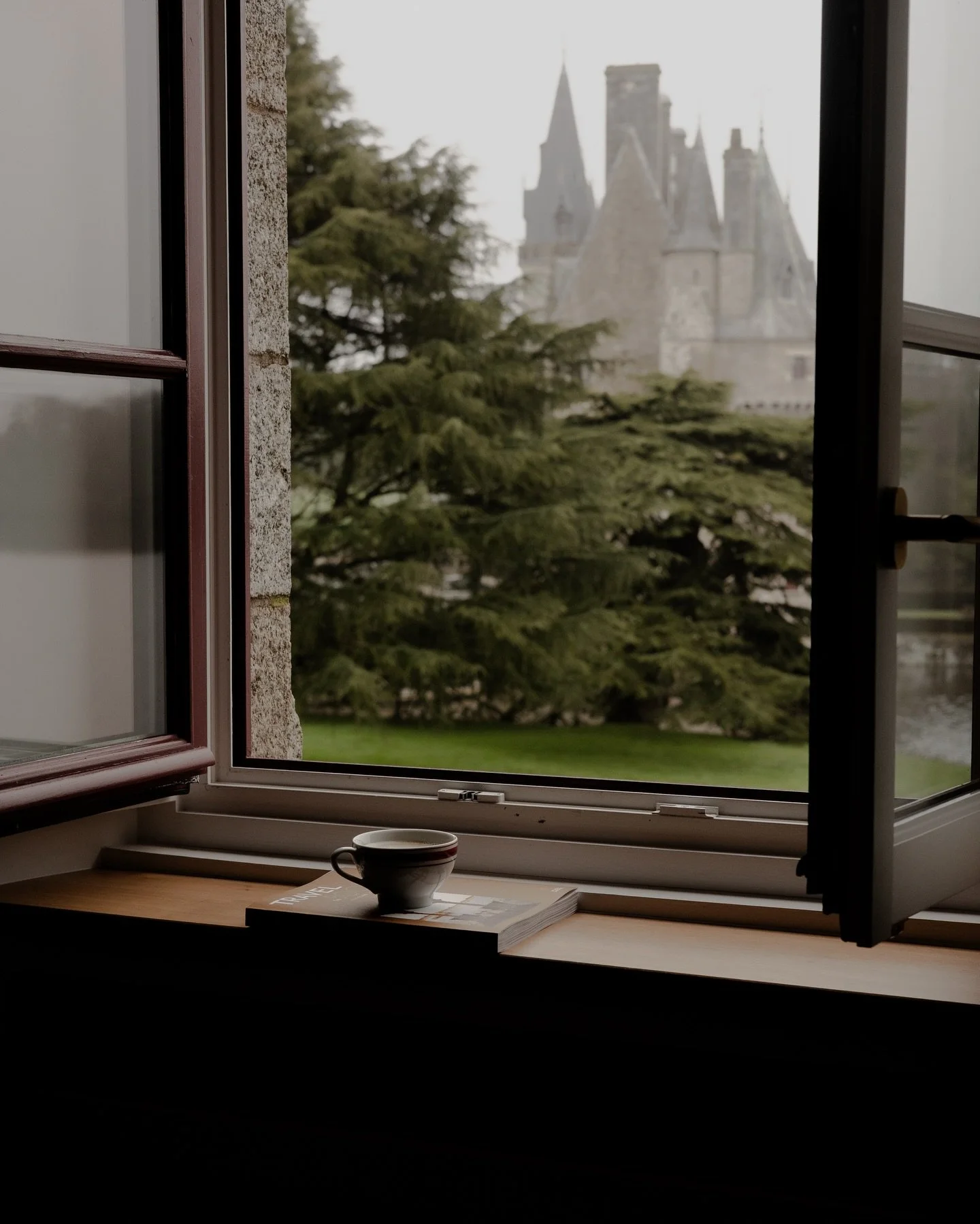 While sun destinations always appeal to us, we have a soft spot for moody weekend getaways in France, and Brittany is perfect for that. 
The mornings at Domaine de la Bretesche were grey, the air fresh and cold, and the castle across the lake felt al