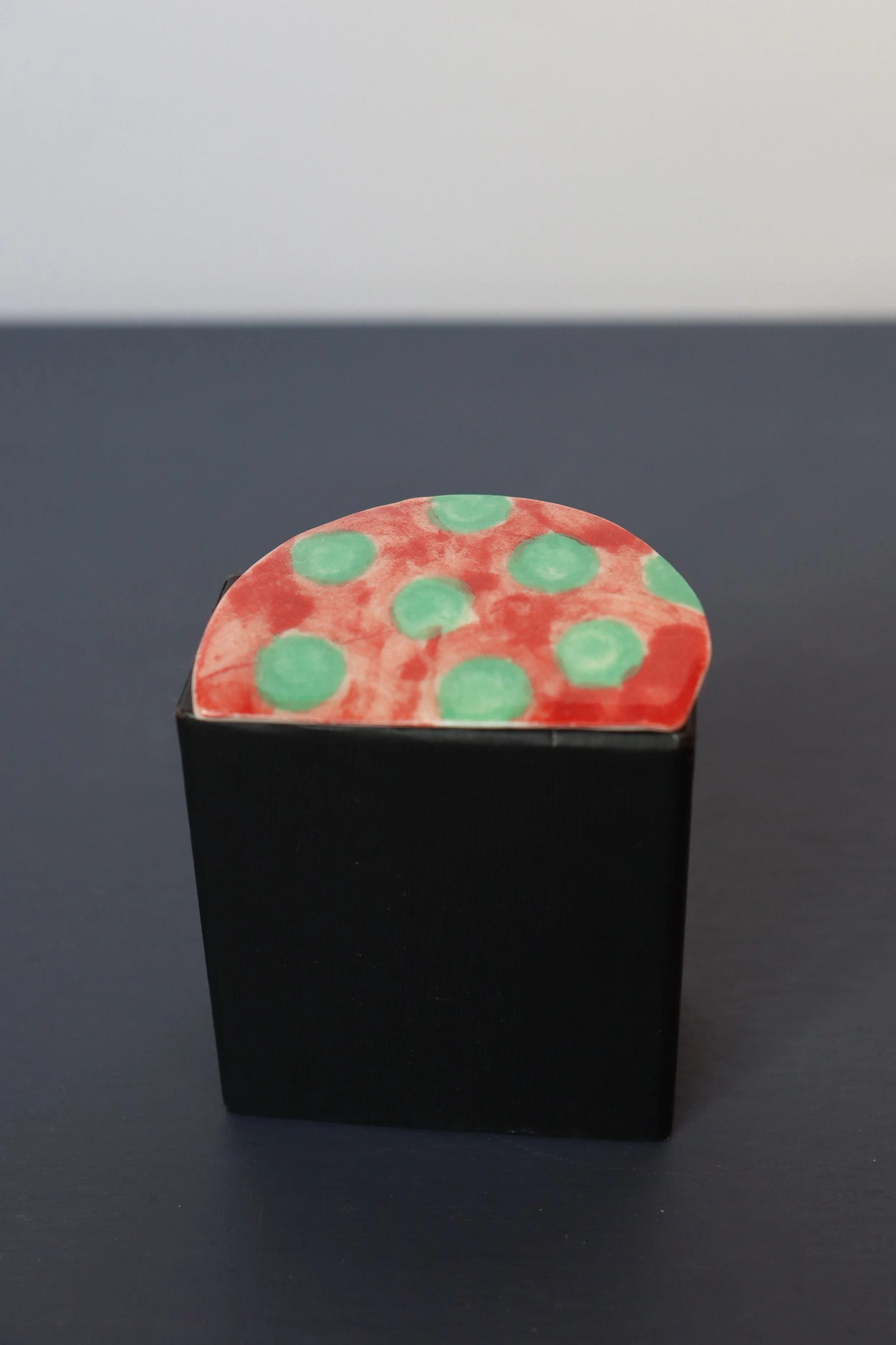 Green Dotty Brooch in Porcelain (red background)
