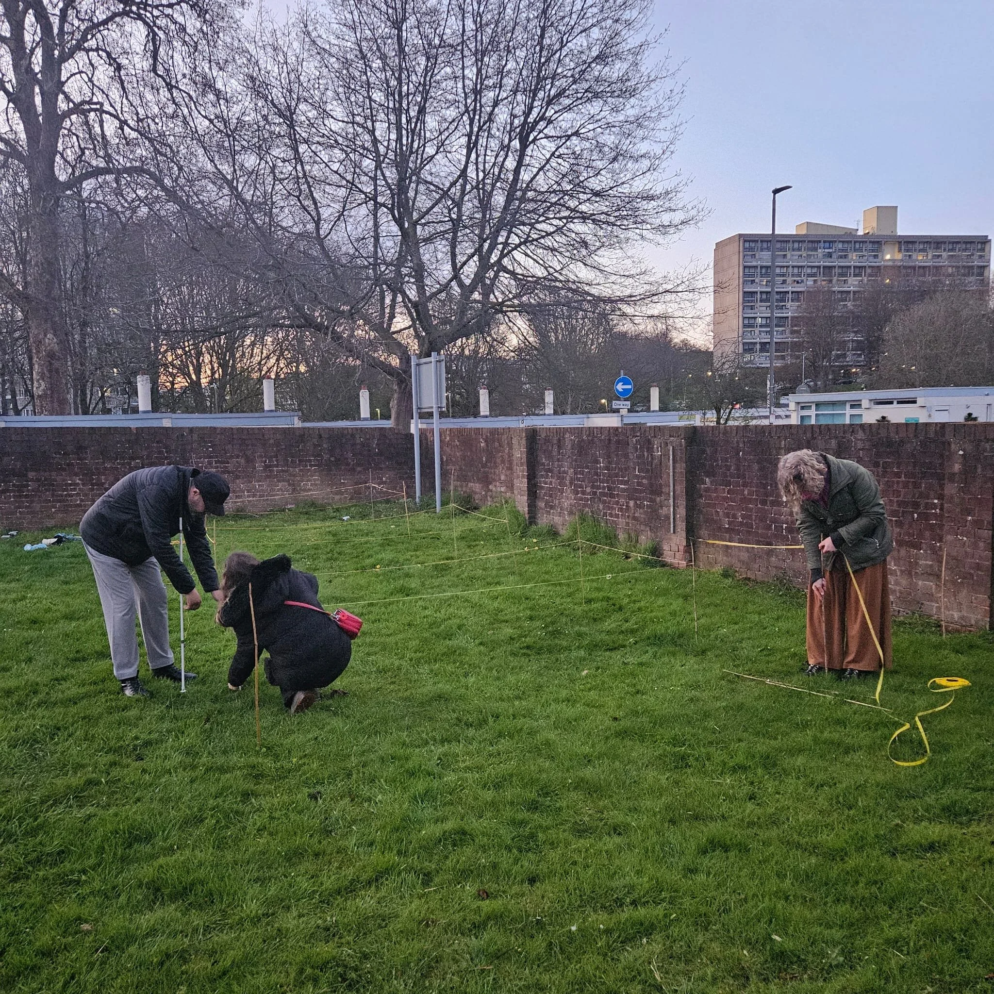 Measuring out where the planters will go with Vicki Cooke our community kitchen gardener, and our panel members.  