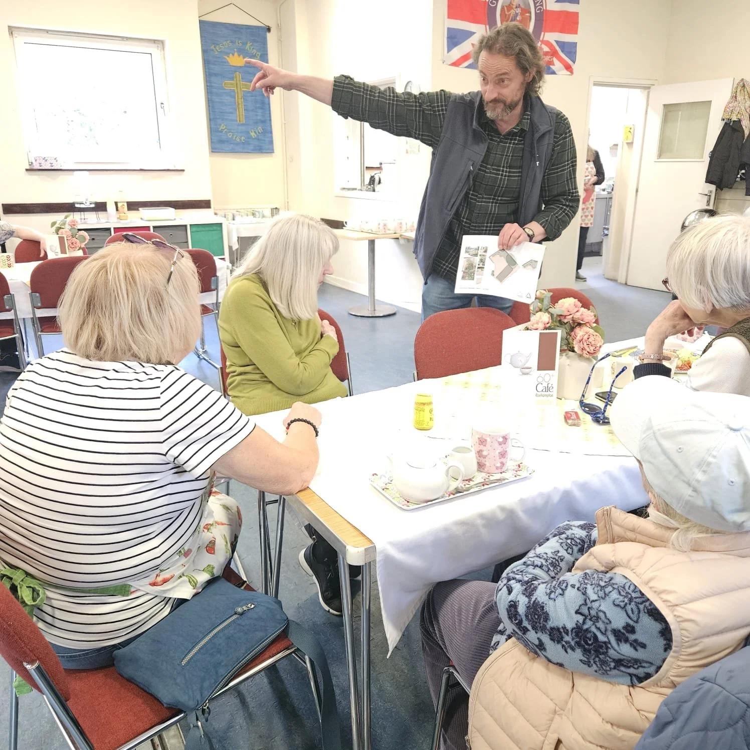 Nick Oliver talking to the over 60's group about the raingarden