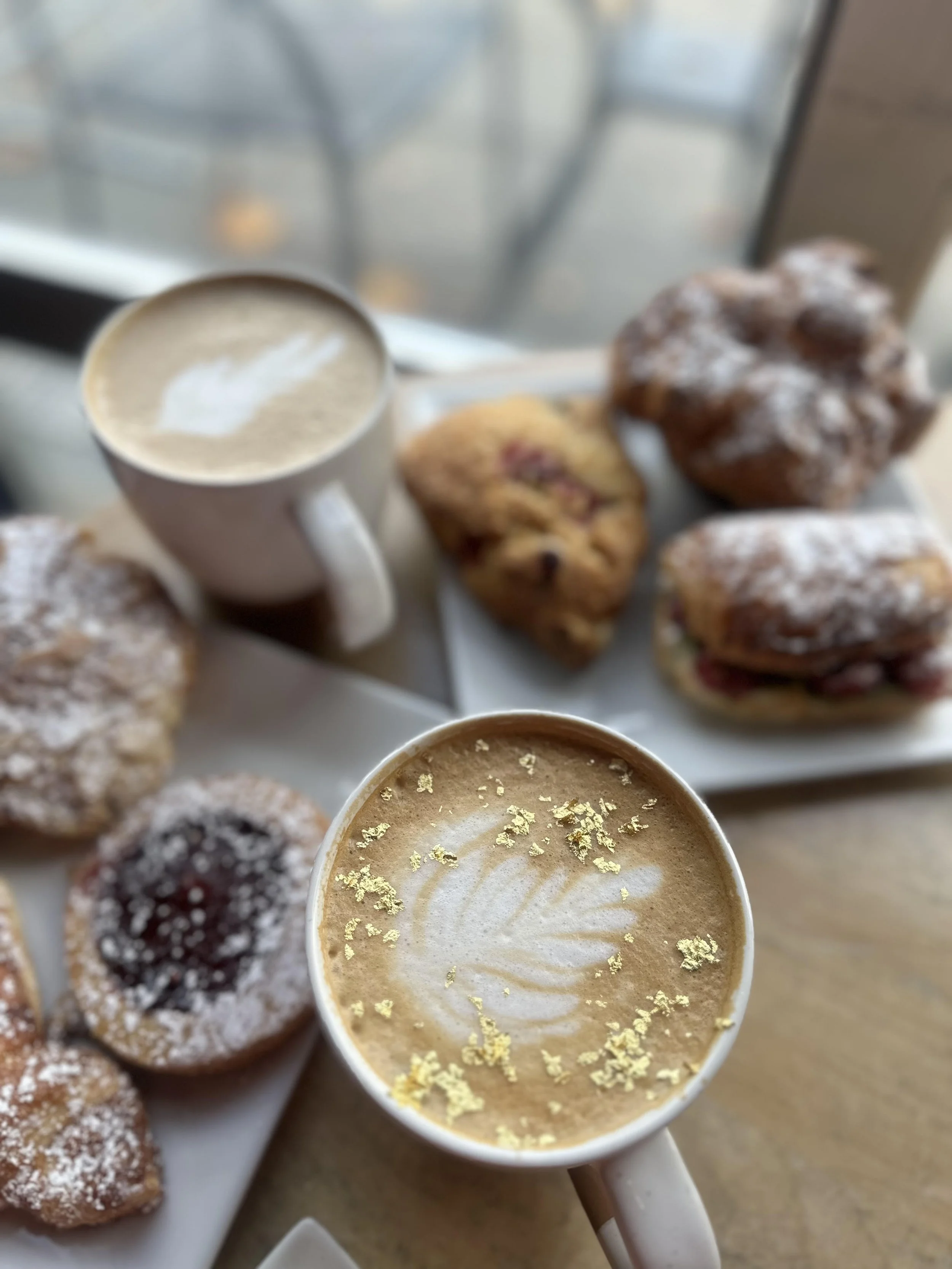 Coffee and pastry upstairs near window of Belle Vie Cafe in Guilford, CT