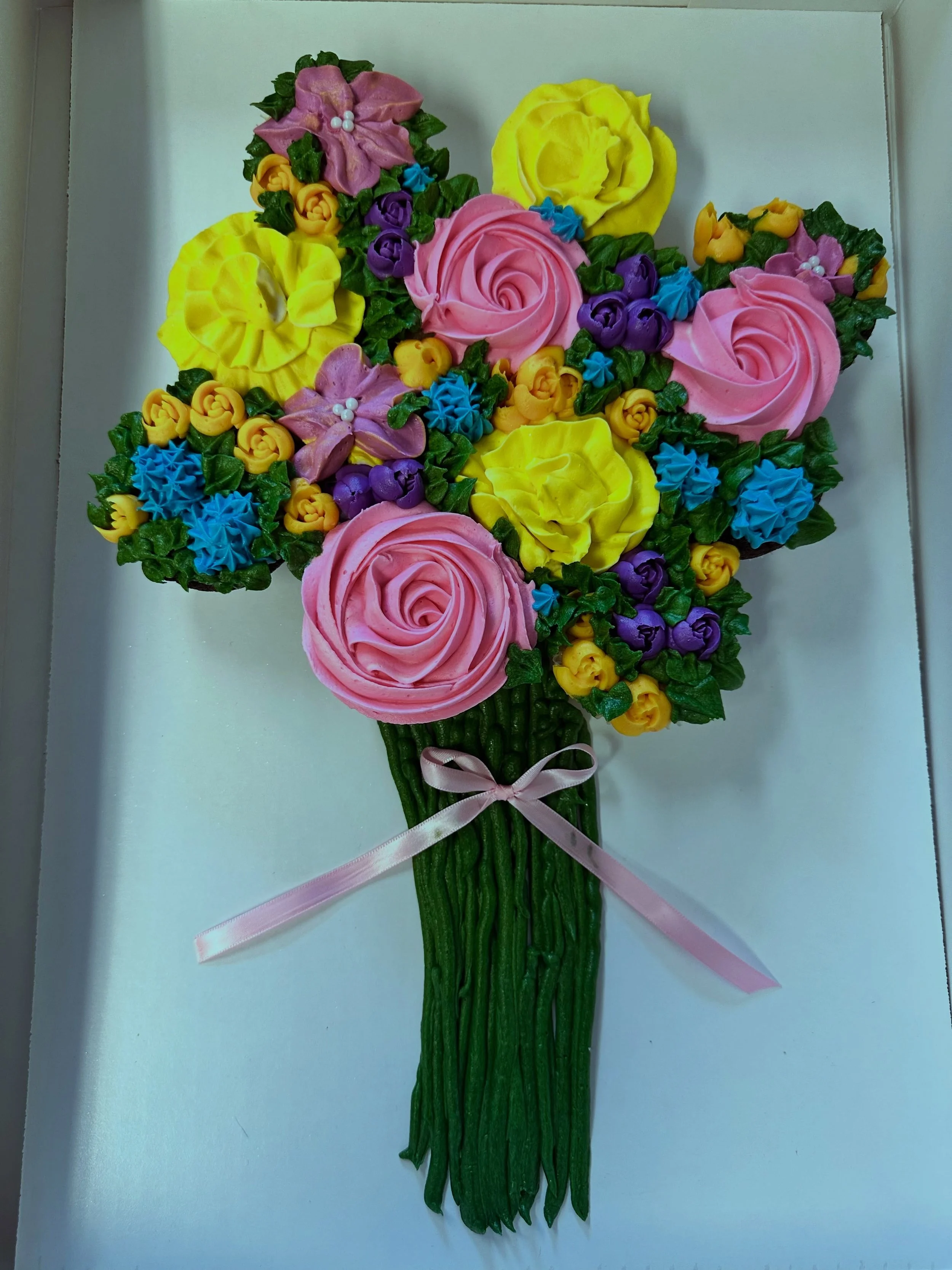 I just received this as a gift. Look how beautiful this is! Made entirely out of cupcakes and icing. Check out @bribakes_21 

Bri is a recent high school grad who is working and doing this on the side. I have tried her treats, they are delicious. She