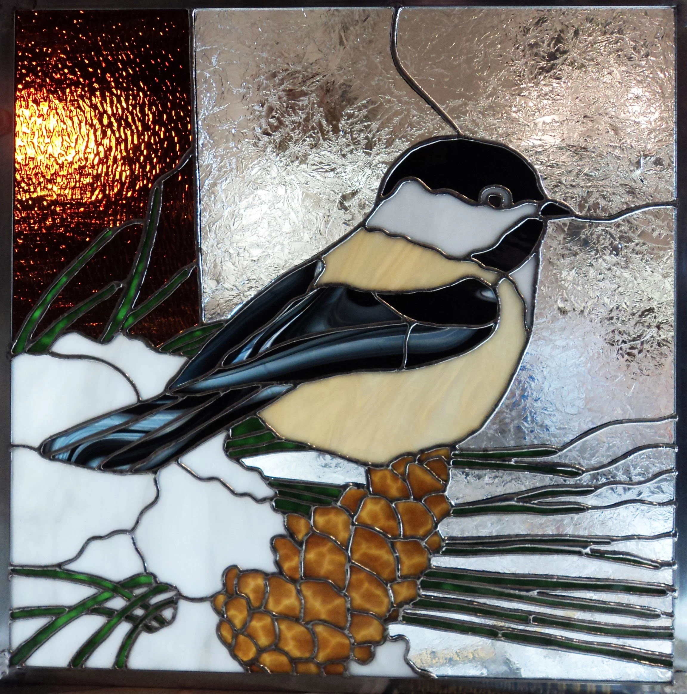 Chickadee on Pine Cone.jpg