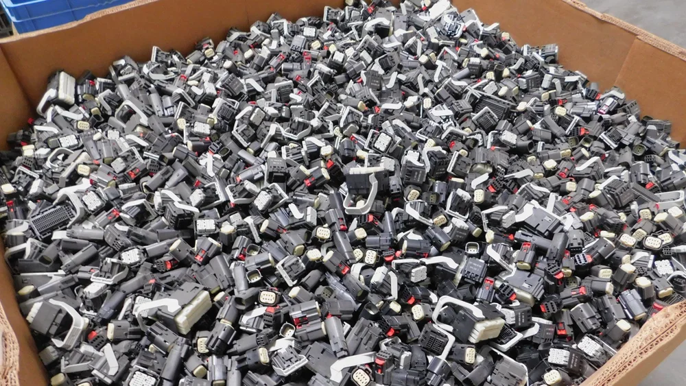 Gaylord full of plastic automotive connector housings