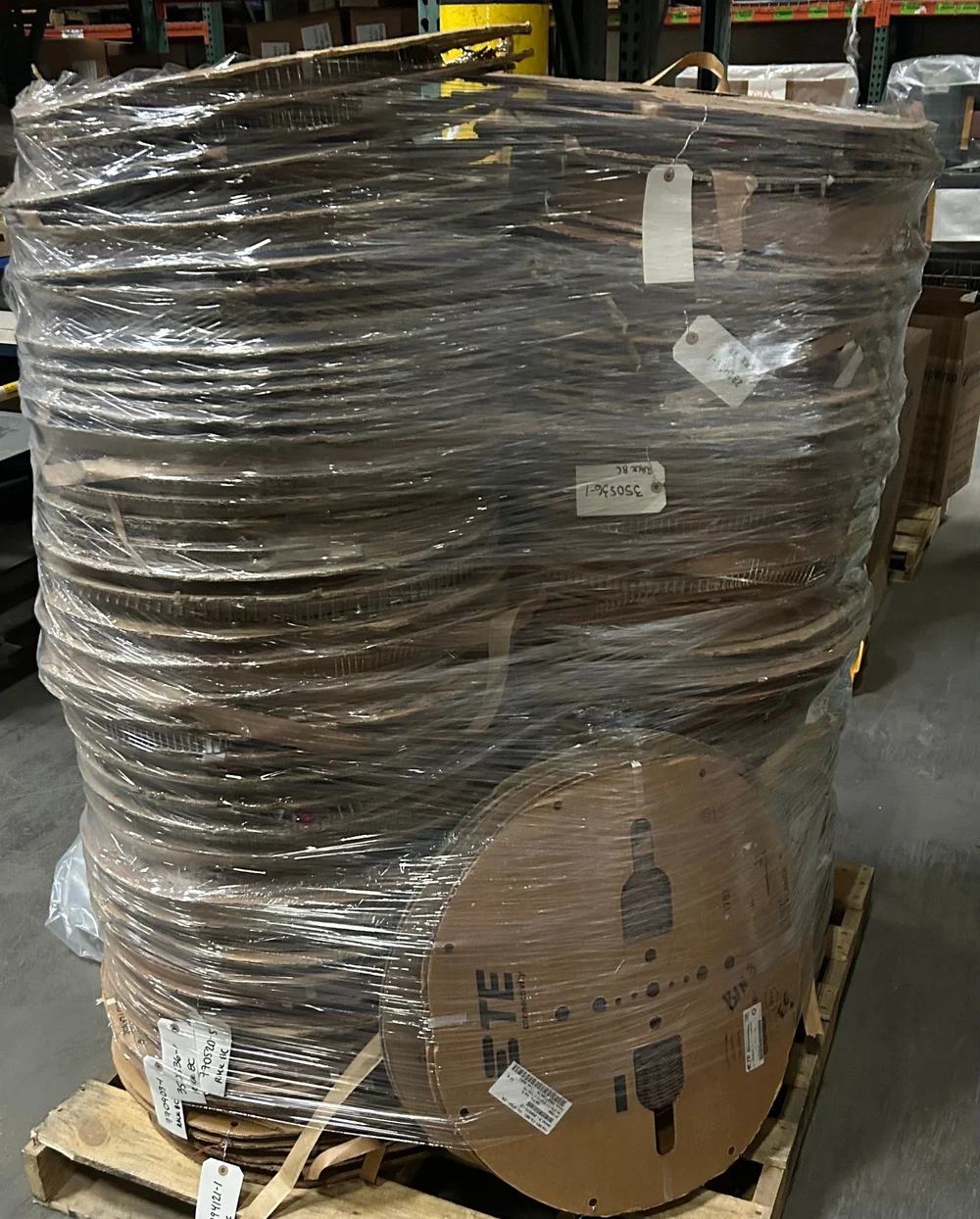 Shrink-wrapped pallet of terminal reels