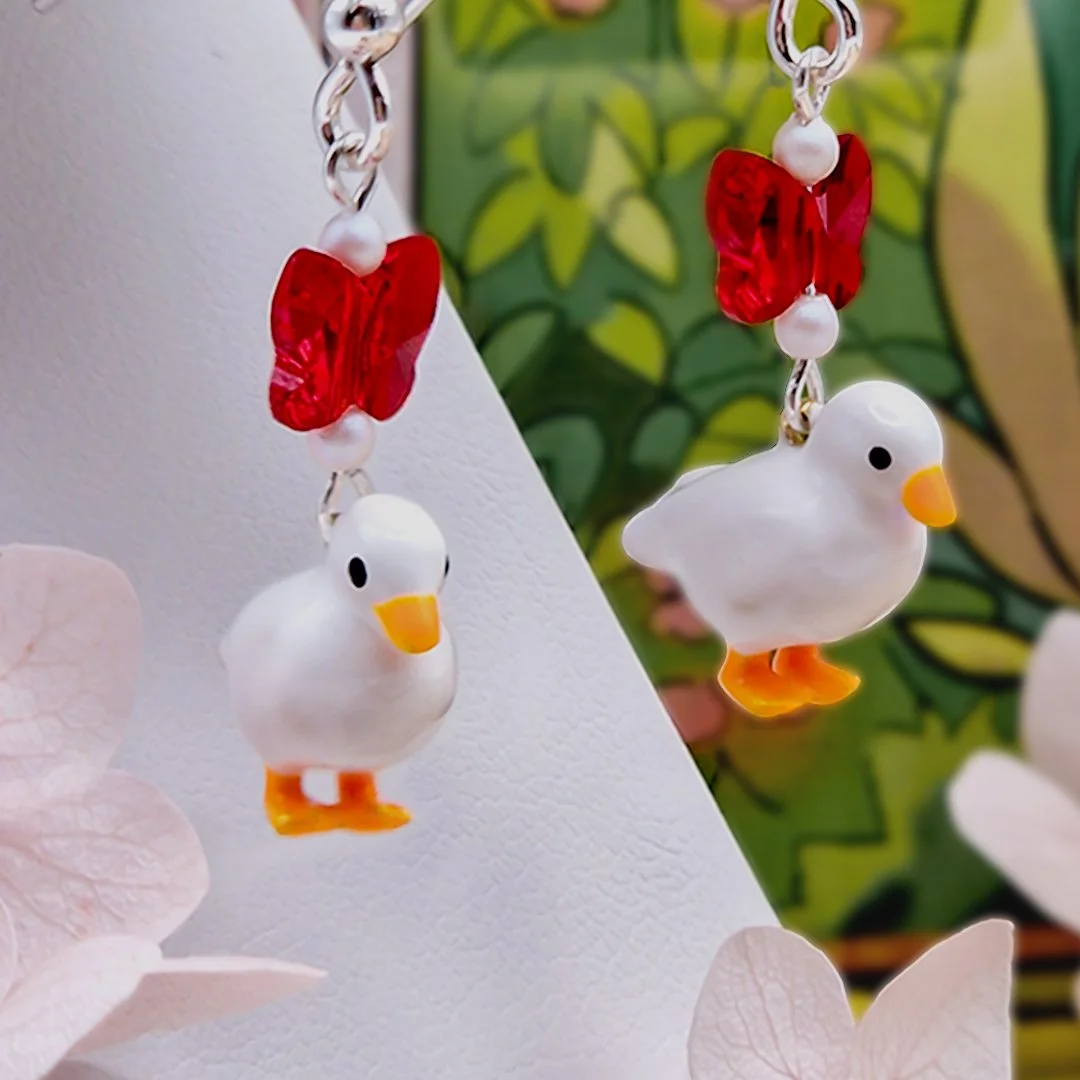 Honk Silver Earrings Close Square.jpg