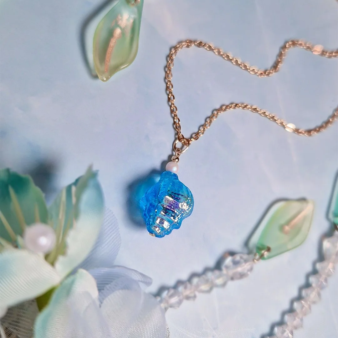 Mermaid Necklace Gold Lie Square.jpg