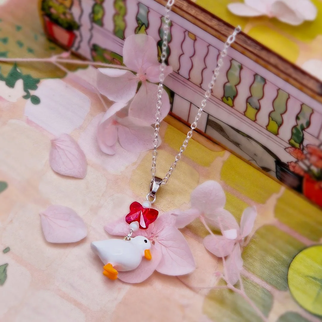 Honk Silver Necklace Square.jpg