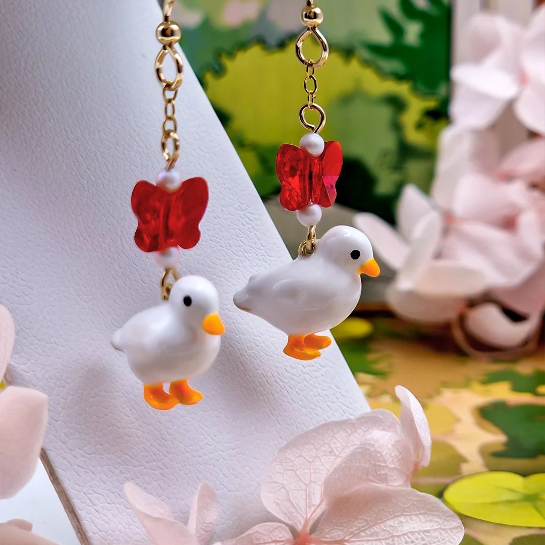 Honk Gold Earrings Side Close Square.jpg