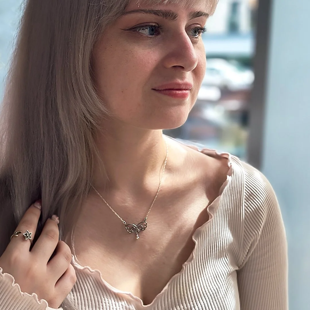 Angelic Wing Necklace Sylvie Model Square.jpg