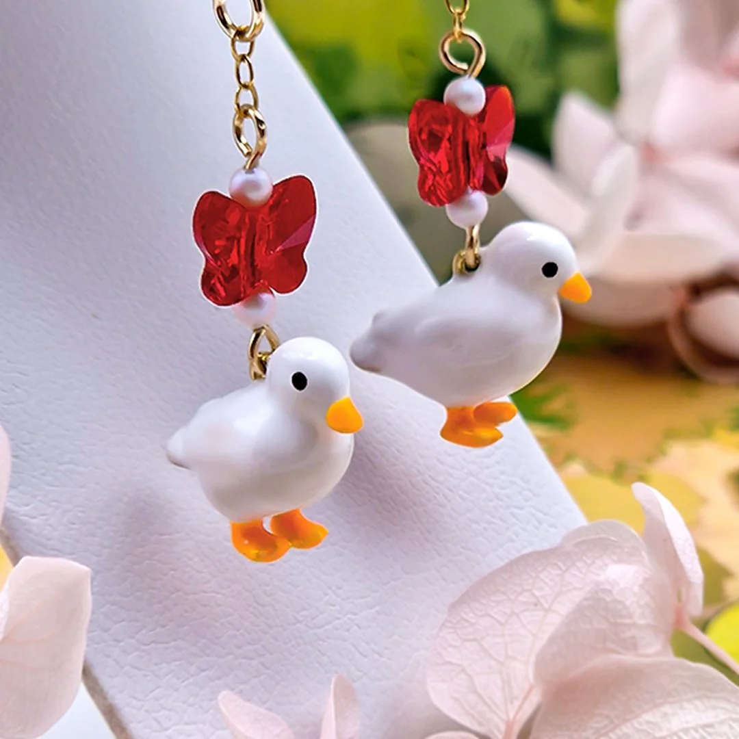 Honk Gold Earrings Close Square.jpg