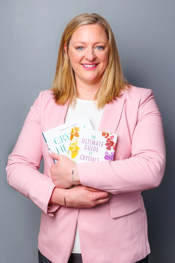 Business owner holding books