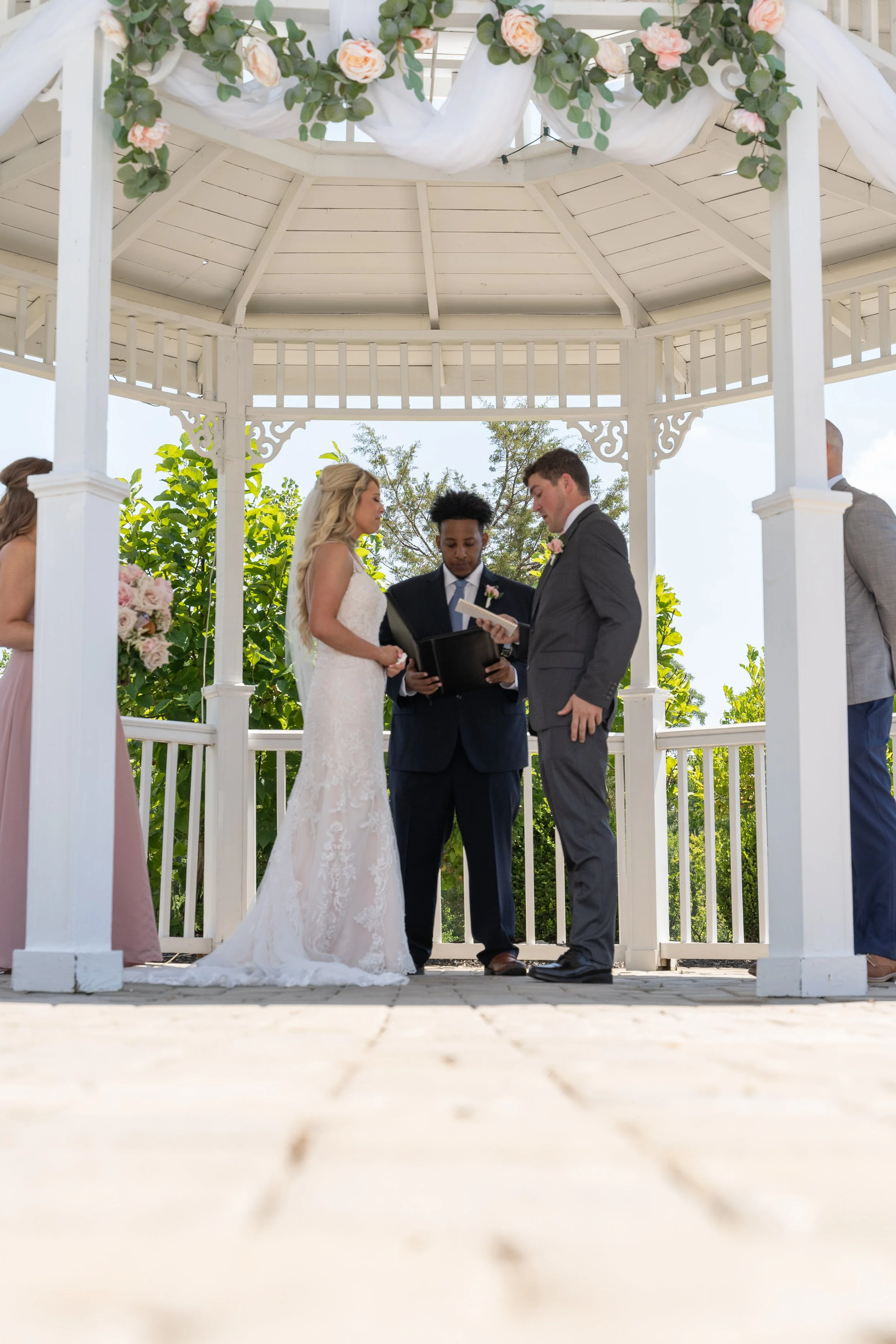 This is a scenic boho rustic view of the outdoor ceremony area of The Magnolia Barn award-winning reception hall outdoor barn wedding venue in Miamisburg at Magnolia Estate. Surrounded by the Greater Dayton, Columbus, and Cincinnati areas. 