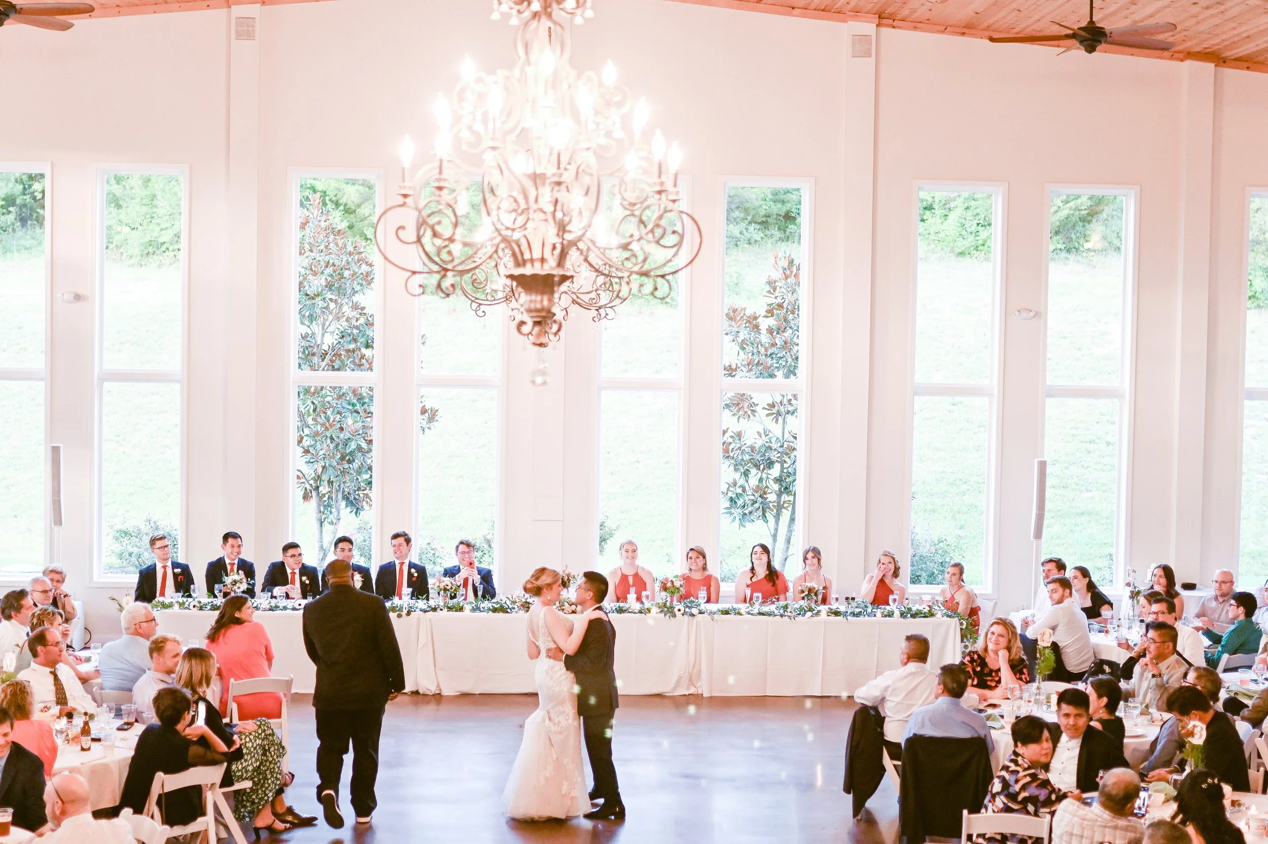 This is a scenic boho elegant rustic view of the inside of the award-winning reception hall outdoor mansion wedding venue Rosewood Manor in Miamisburg at Magnolia Estate. Surrounded by the Greater Dayton, Columbus, and Cincinnati areas. 