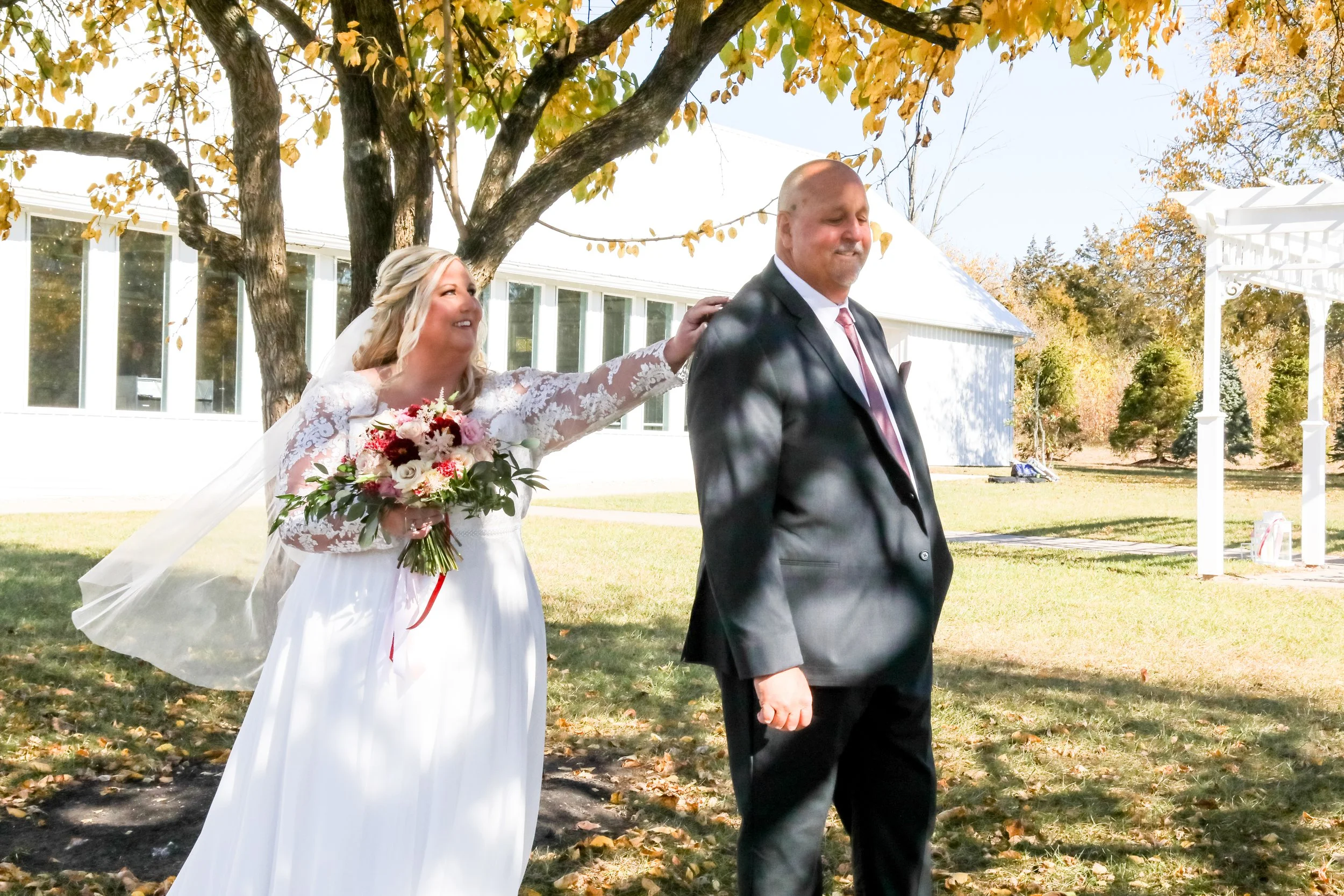 This is a scenic boho rustic view of the grounds at The Magnolia Barn award-winning reception hall outdoor barn wedding venue in Miamisburg at Magnolia Estate. Surrounded by the Greater Dayton, Columbus, and Cincinnati areas. 