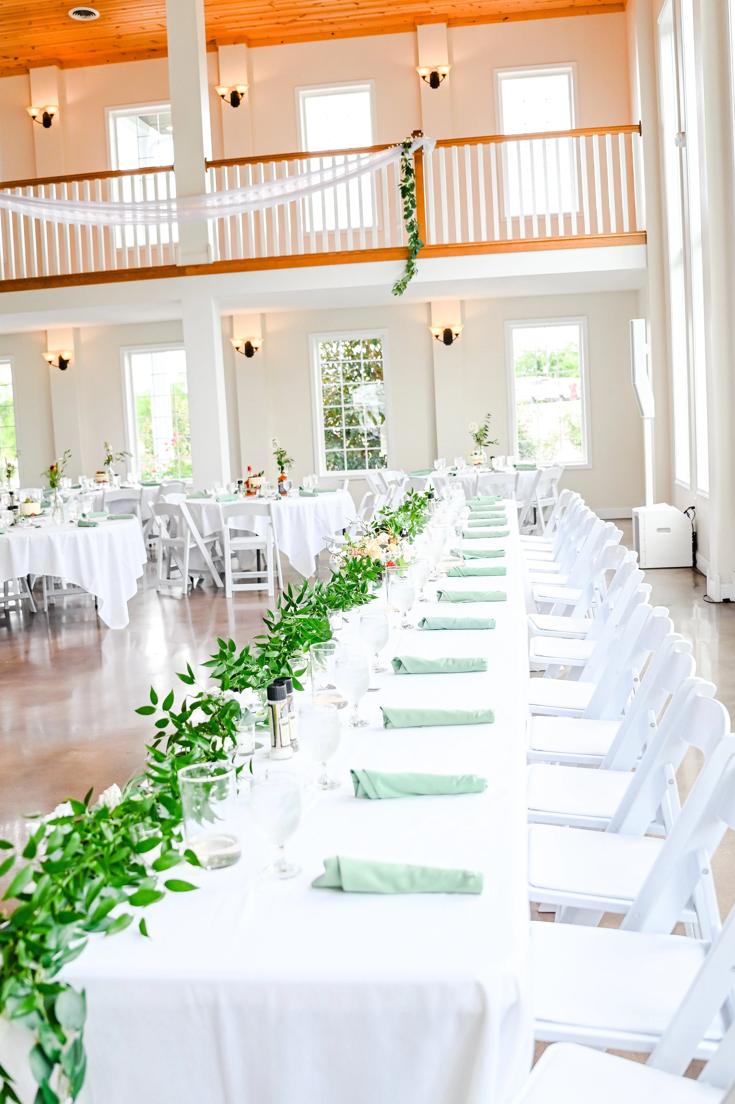 This is a scenic boho elegant rustic view of the inside of the award-winning reception hall outdoor mansion wedding venue Rosewood Manor in Miamisburg at Magnolia Estate. Surrounded by the Greater Dayton, Columbus, and Cincinnati areas. 